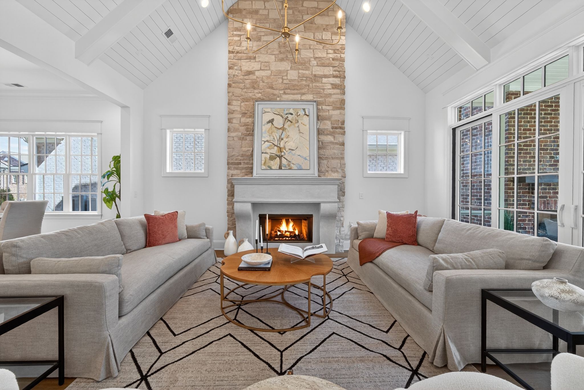 7042 Kinderhook Road Nashville, TN 37221 - Photo 22 of 87 a living room with furniture a window and a fireplace