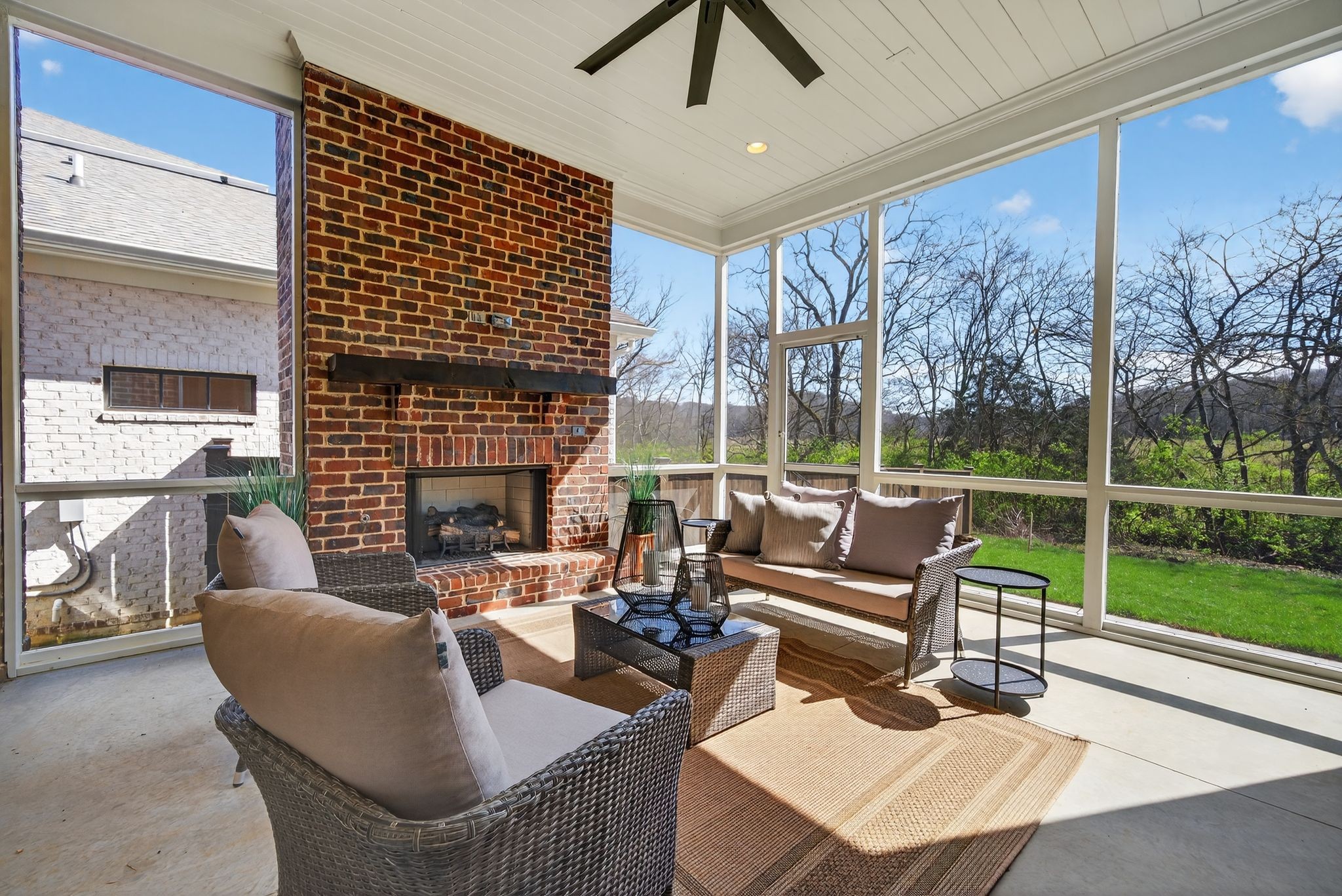 7042 Kinderhook Road Nashville, TN 37221 - Photo 28 of 87 a living room with fireplace furniture and a large window