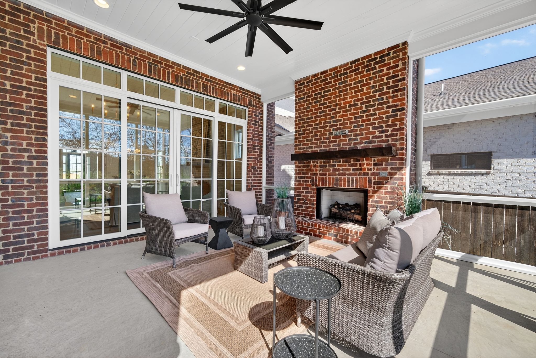 7042 Kinderhook Road Nashville, TN 37221 - Photo 31 of 87 a living room with furniture and a fireplace