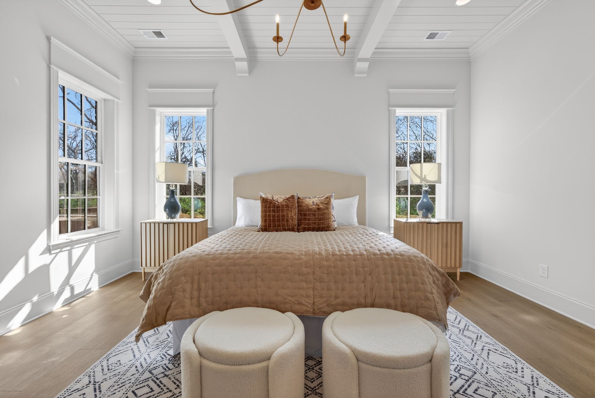 7042 Kinderhook Road Nashville, TN 37221 - Photo 42 of 87 a bedroom with a bed and wooden floor