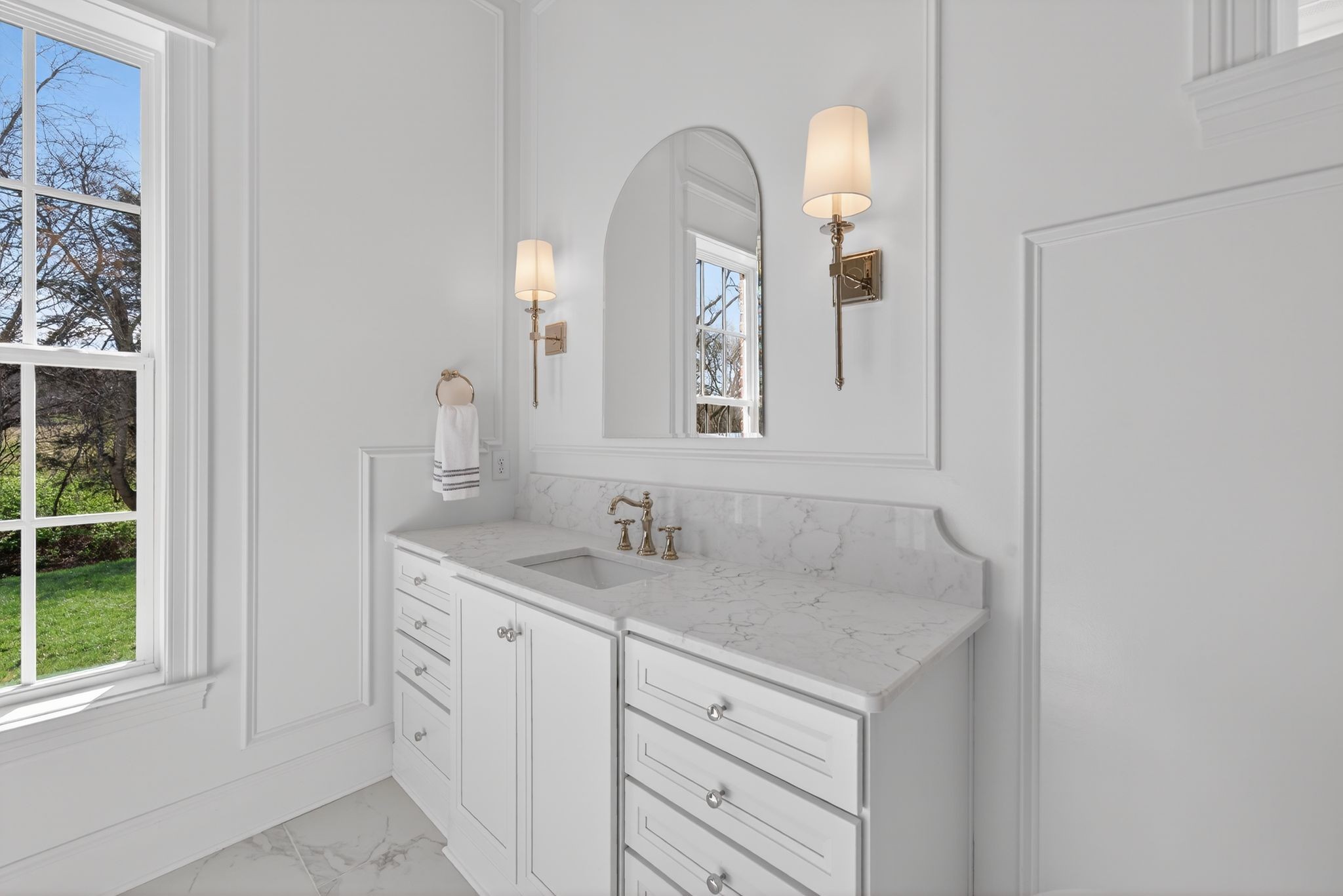 7042 Kinderhook Road Nashville, TN 37221 - Photo 47 of 87 a bathroom with a granite countertop sink and a mirror