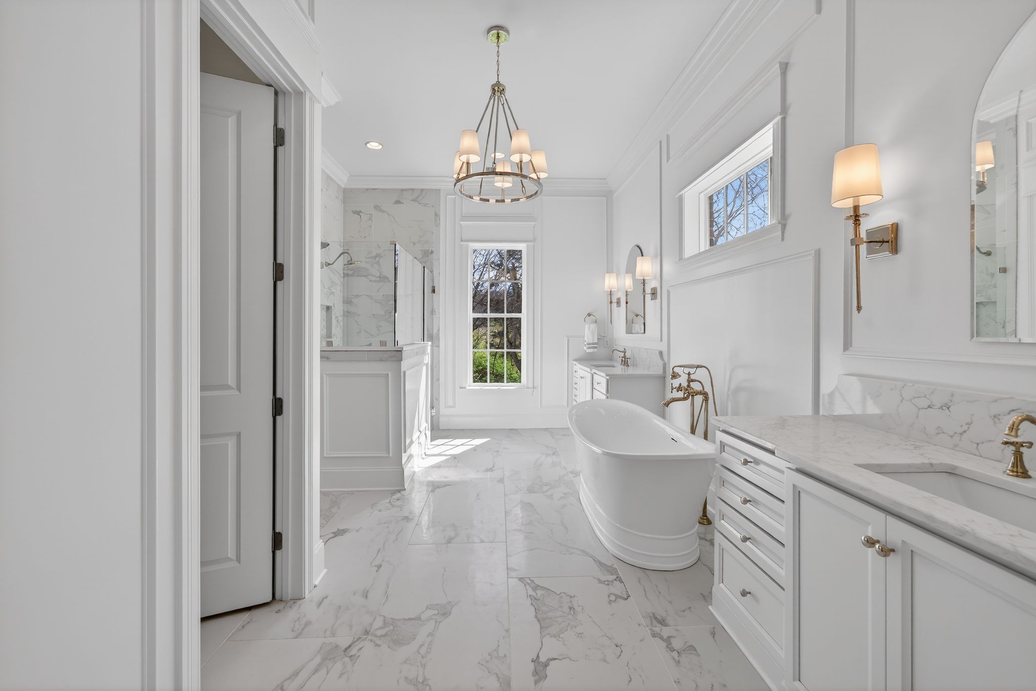 7042 Kinderhook Road Nashville, TN 37221 - Photo 50 of 87 a spacious bathroom with a sink a mirror and a shower
