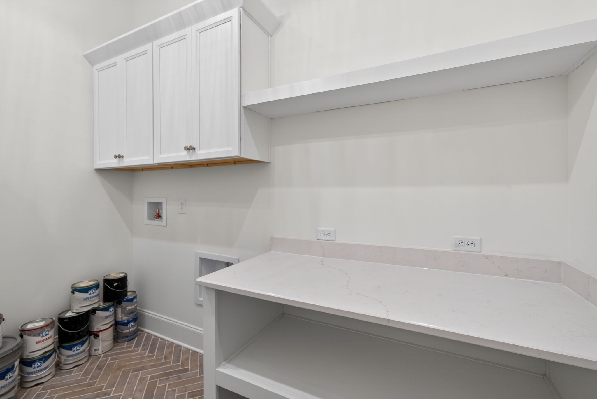 7042 Kinderhook Road Nashville, TN 37221 - Photo 59 of 87 a room with a white cabinets and a wooden floor