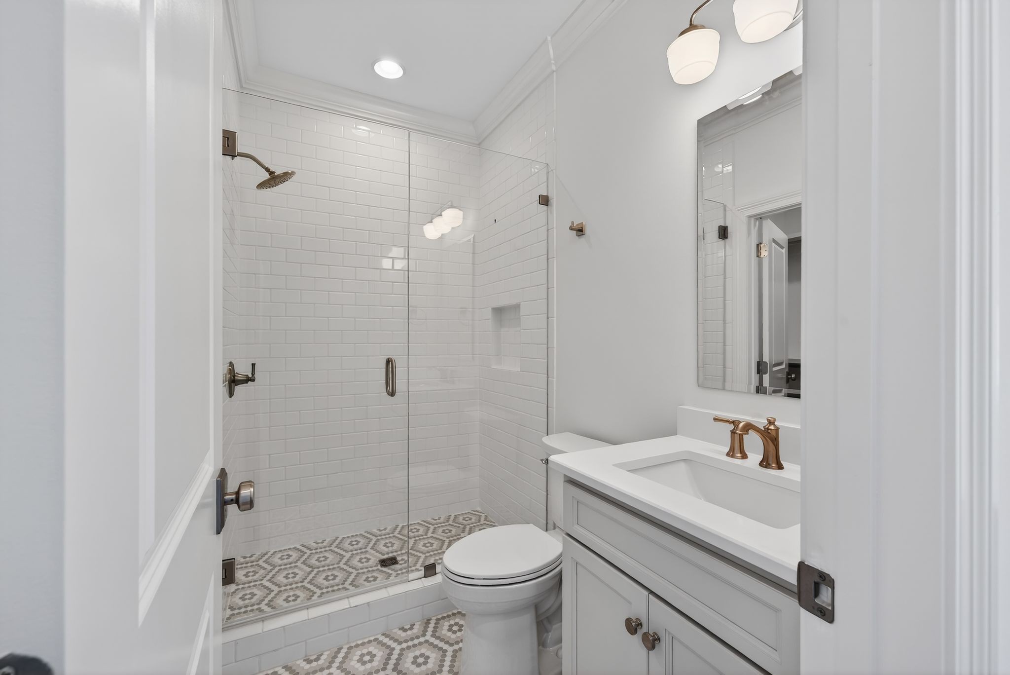 7042 Kinderhook Road Nashville, TN 37221 - Photo 64 of 87 a bathroom with a sink toilet and shower