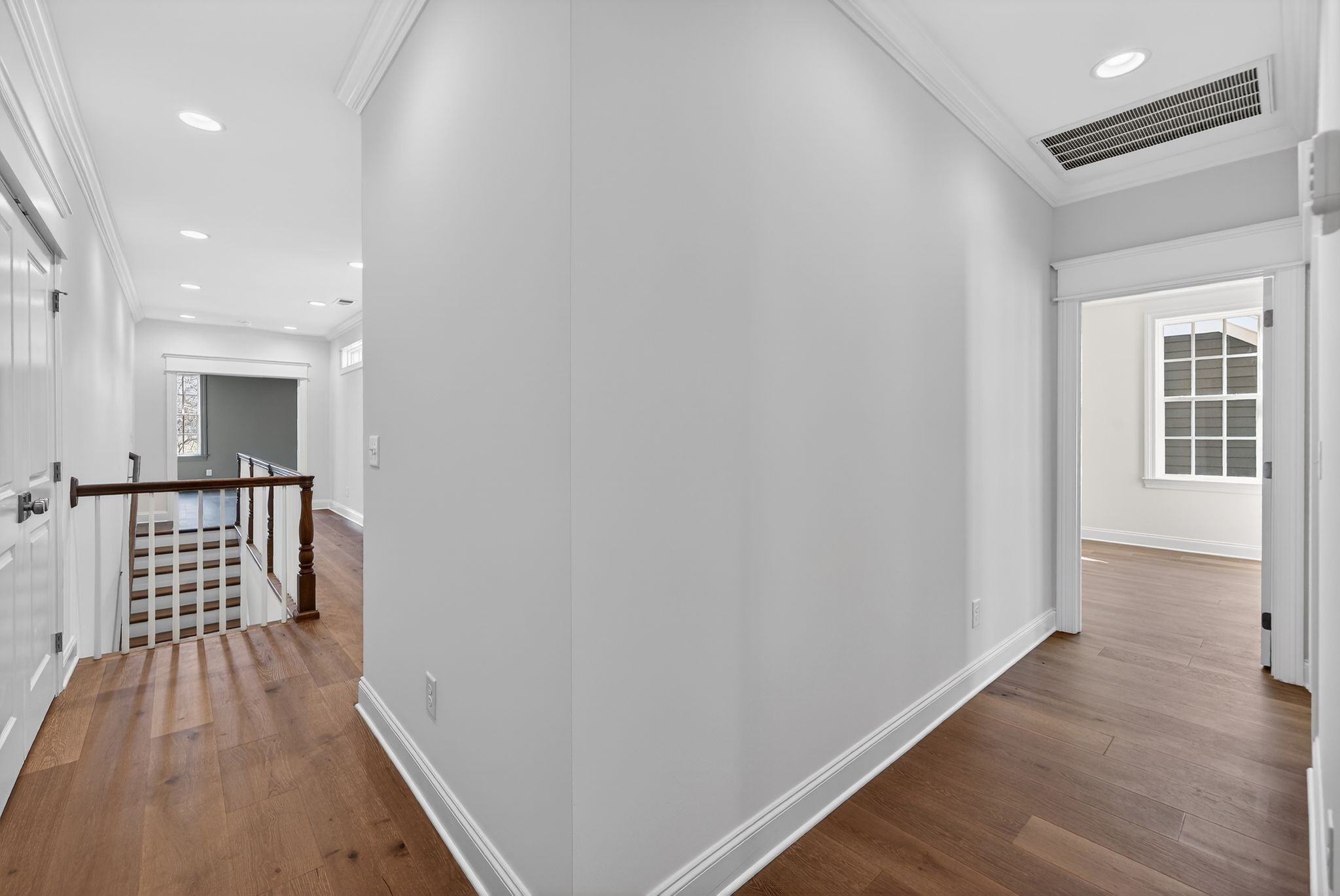 7042 Kinderhook Road Nashville, TN 37221 - Photo 67 of 87 a view of hallway with wooden floor and chair