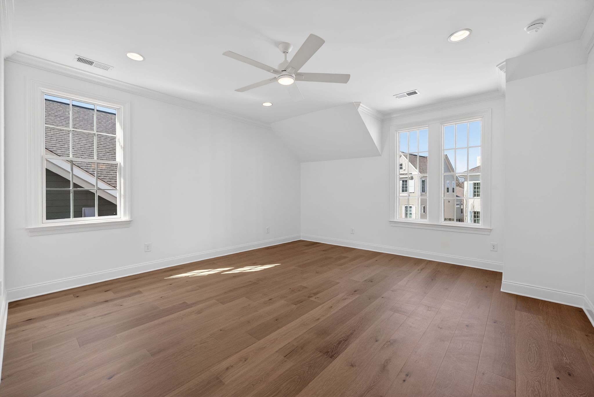 7042 Kinderhook Road Nashville, TN 37221 - Photo 70 of 87 a view of an empty room with wooden floor and a window