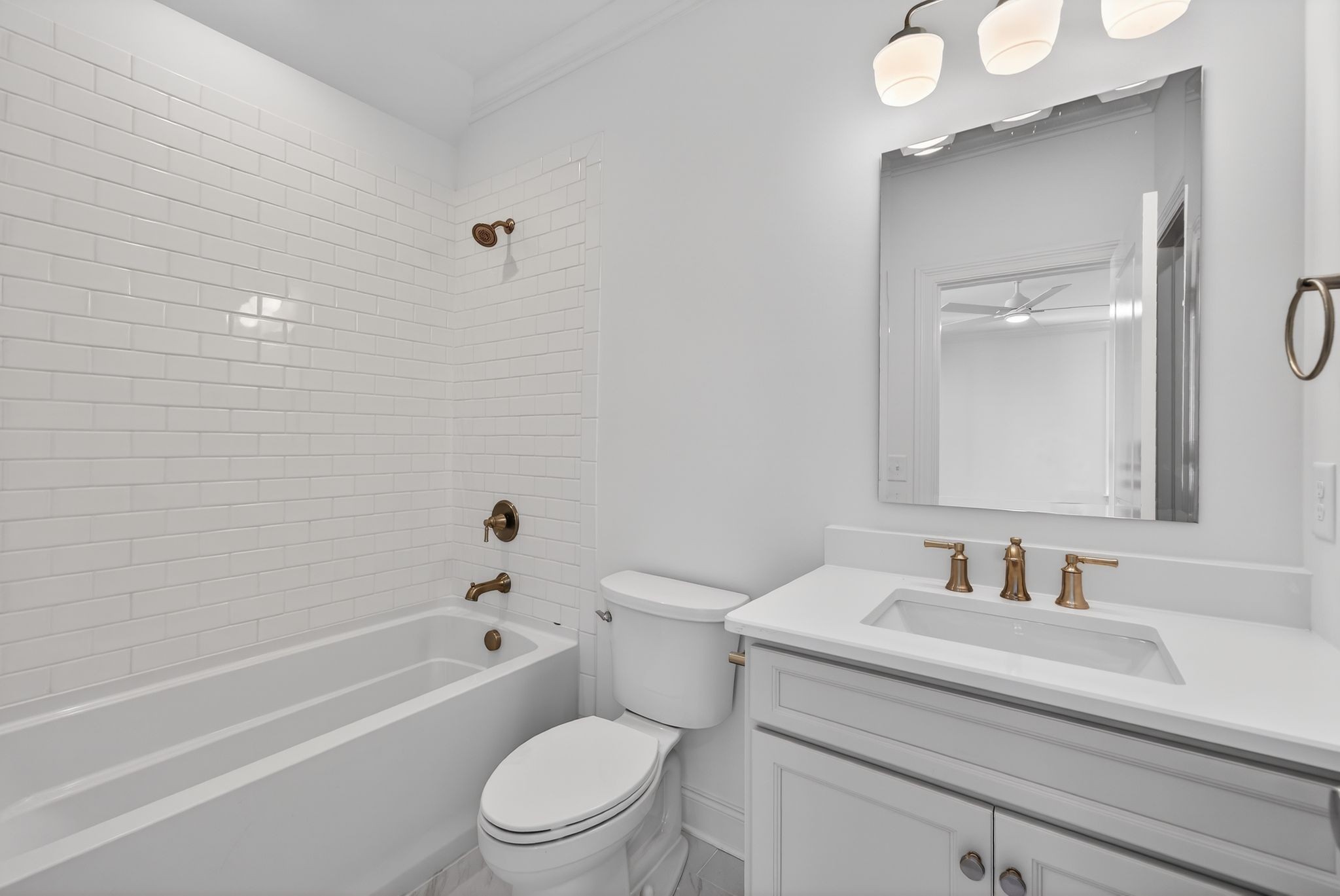 7042 Kinderhook Road Nashville, TN 37221 - Photo 71 of 87 a bathroom with a sink a toilet and shower