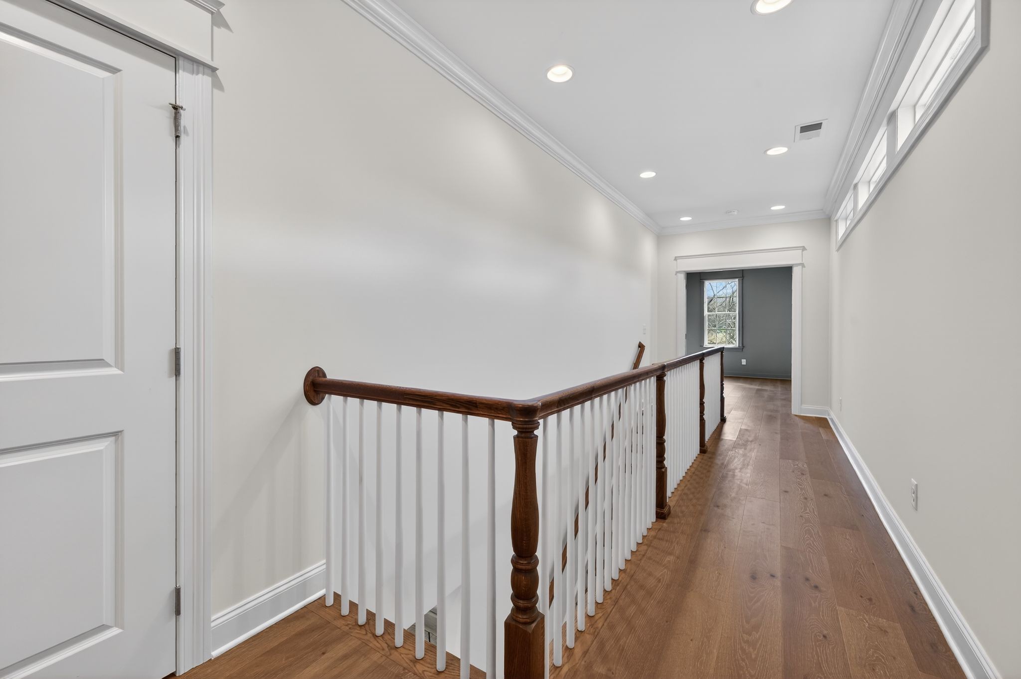 7042 Kinderhook Road Nashville, TN 37221 - Photo 72 of 87 a view of a hallway with wooden floor