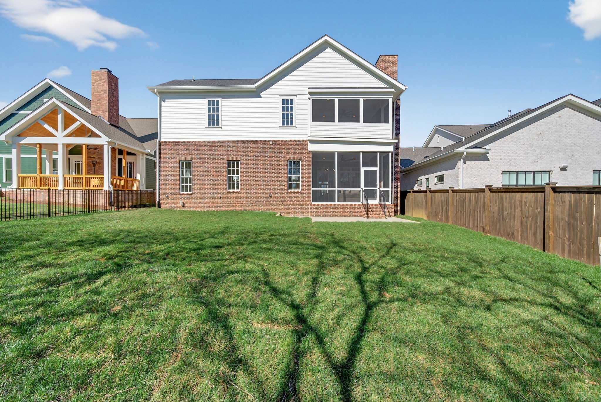 7042 Kinderhook Road Nashville, TN 37221 - Photo 83 of 87 a front view of a house with yard and green space
