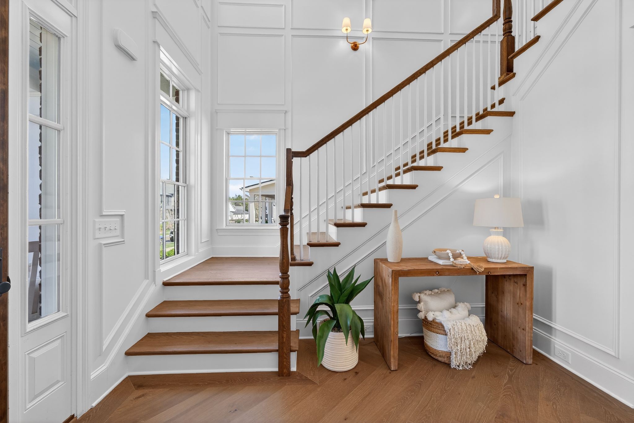 7042 Kinderhook Road Nashville, TN 37221 - Photo 9 of 87 a view of entryway with wooden floor and stairs