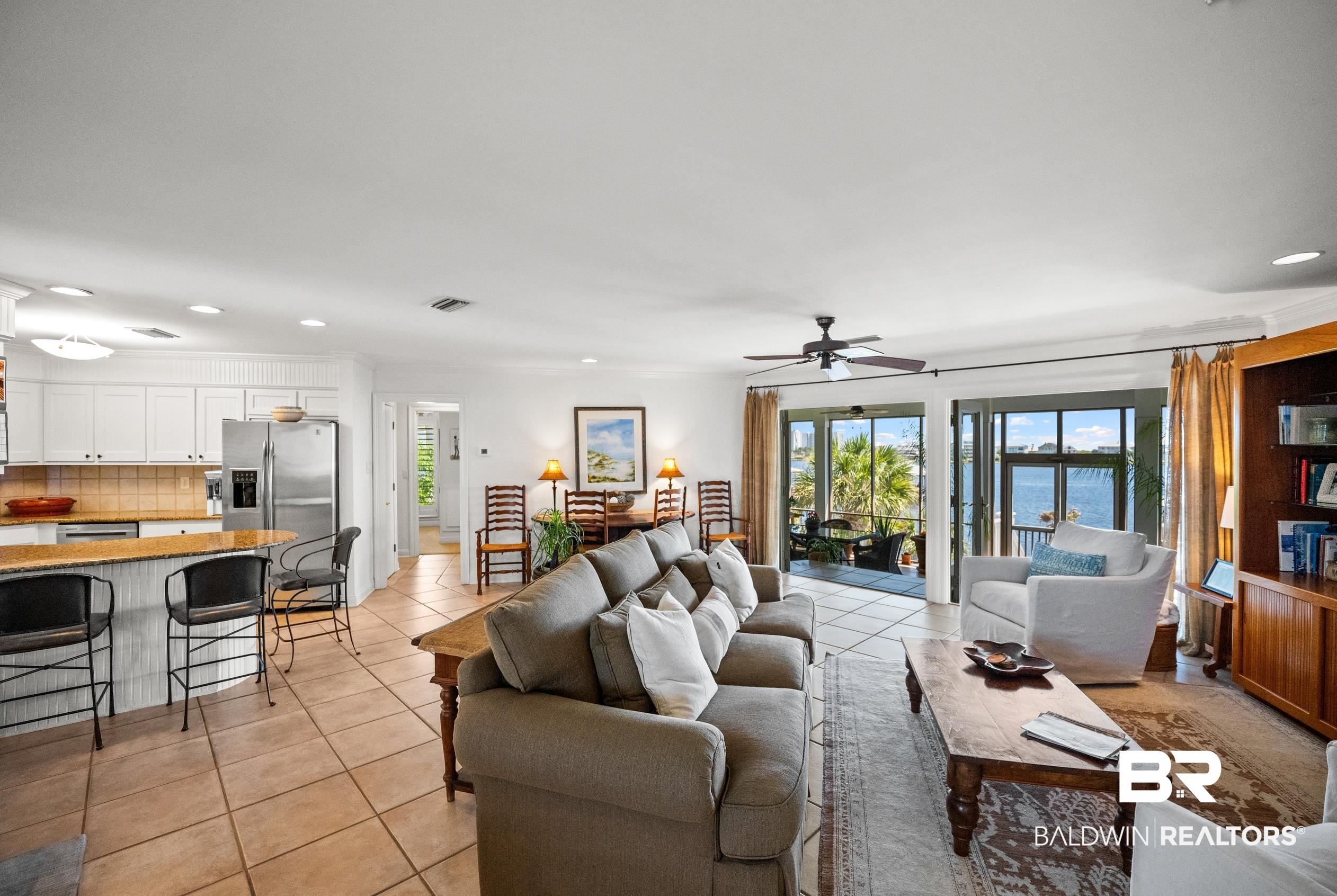 31304 River Road Orange Beach, AL 36561 - Photo 4 of 78 Living area featuring light tile patterned floors, ceiling fan, recessed lighting, and visible vents