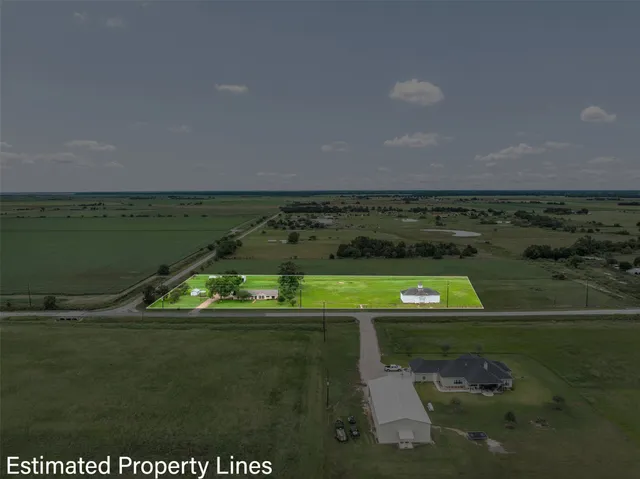 a view of a lake with a big yard