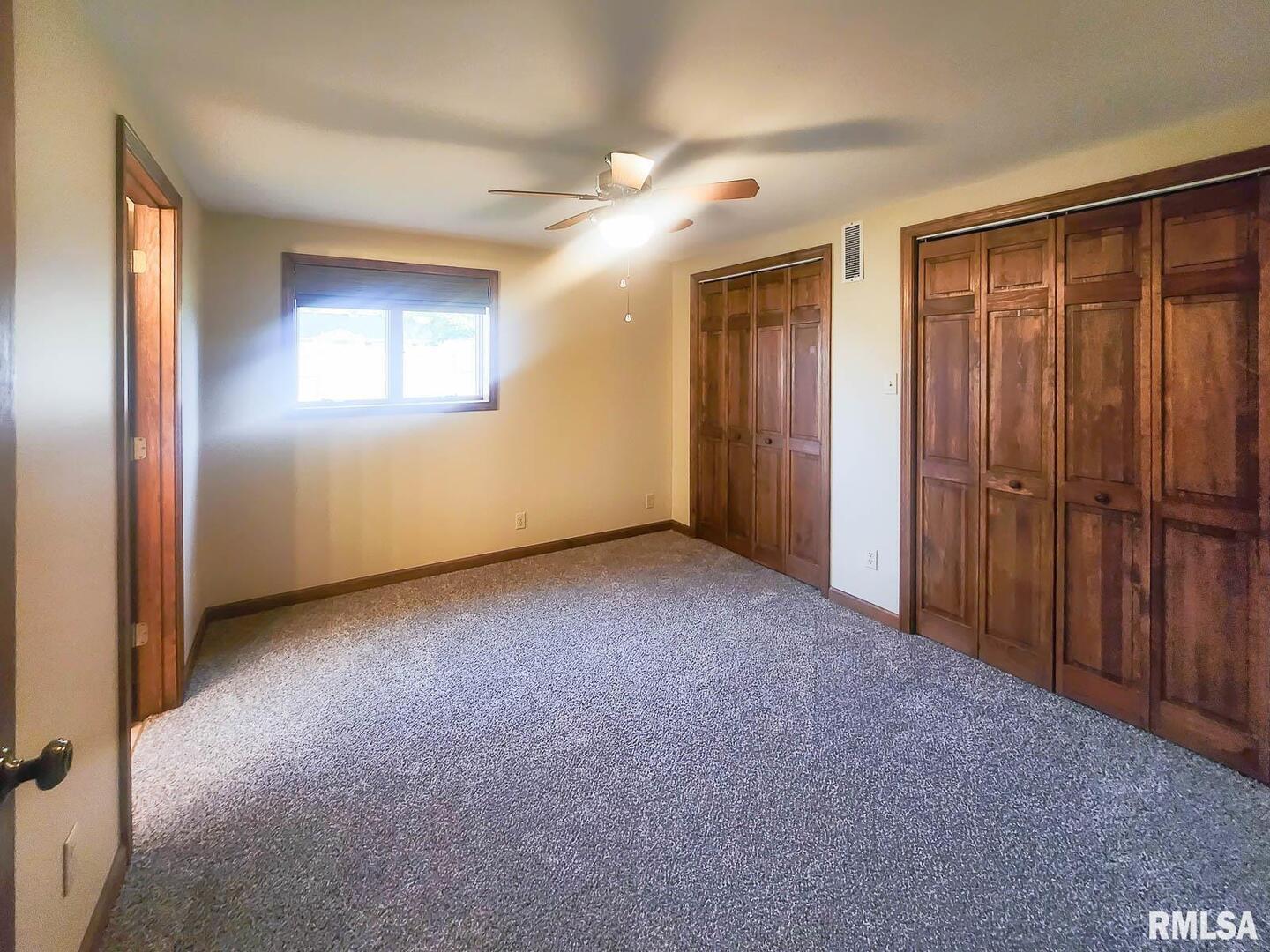 2878 Sunfield Road Du Quoin, IL 62832 - Photo 36 of 47 an empty room with windows and closet
