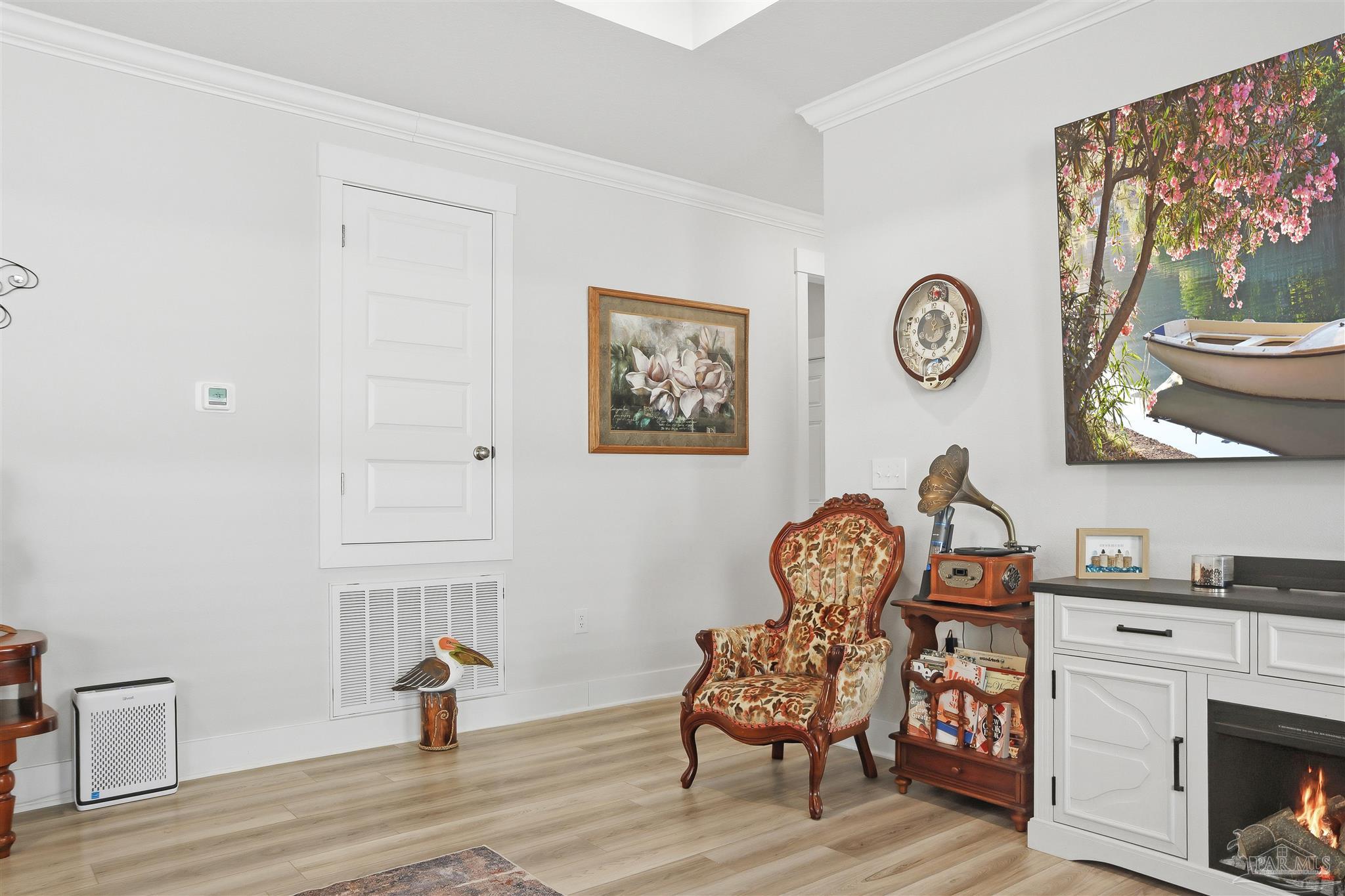 1932 Appleton Drive Cantonment, FL 32533 - Photo 12 of 57 a view of a workspace with furniture and wooden floor
