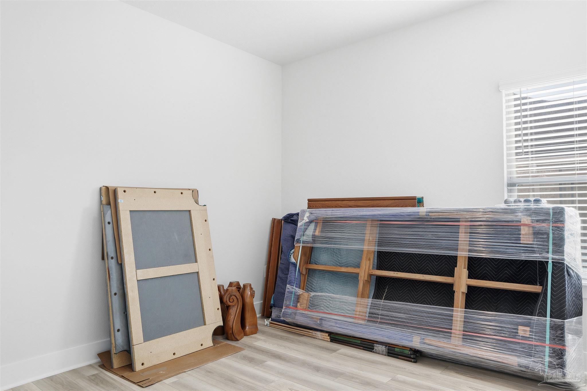1932 Appleton Drive Cantonment, FL 32533 - Photo 22 of 57 a view of a room with wooden floor