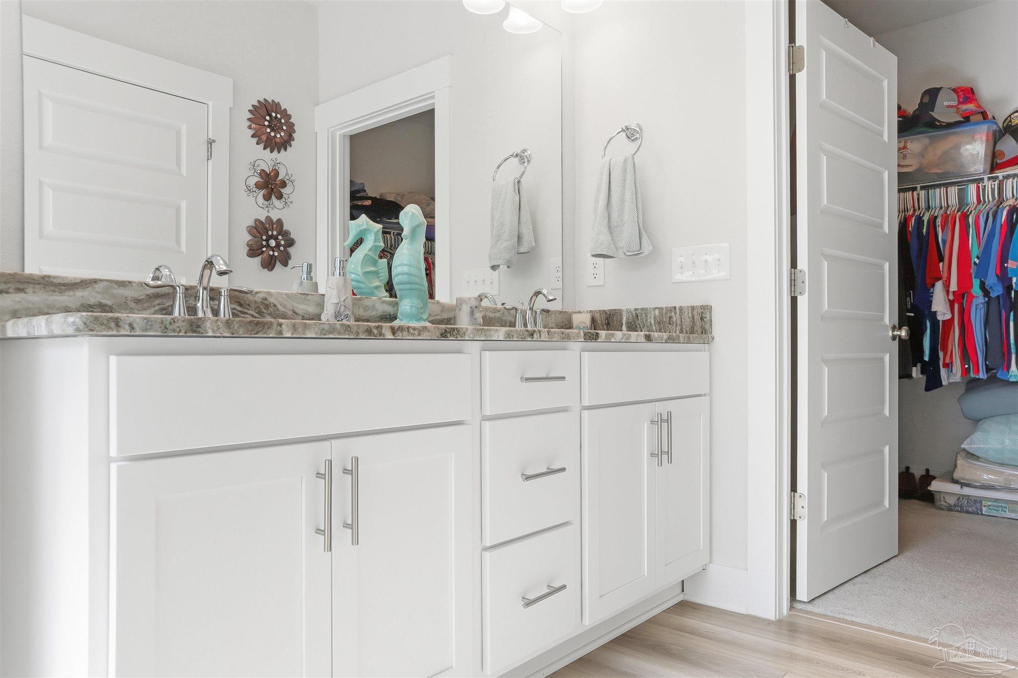 1932 Appleton Drive Cantonment, FL 32533 - Photo 41 of 57 a bathroom with a sink and a mirror