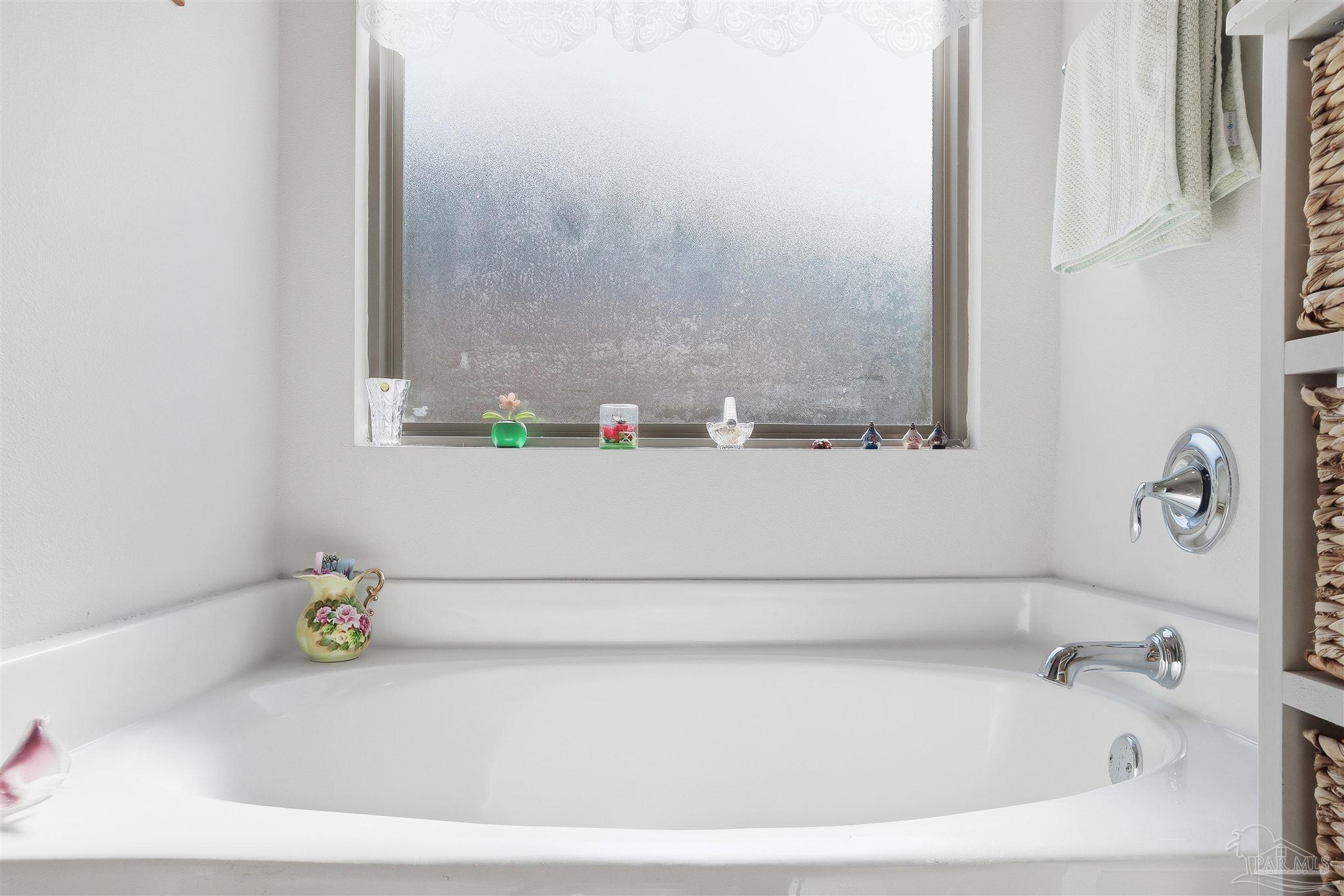 1932 Appleton Drive Cantonment, FL 32533 - Photo 42 of 57 a bathroom with a bathtub