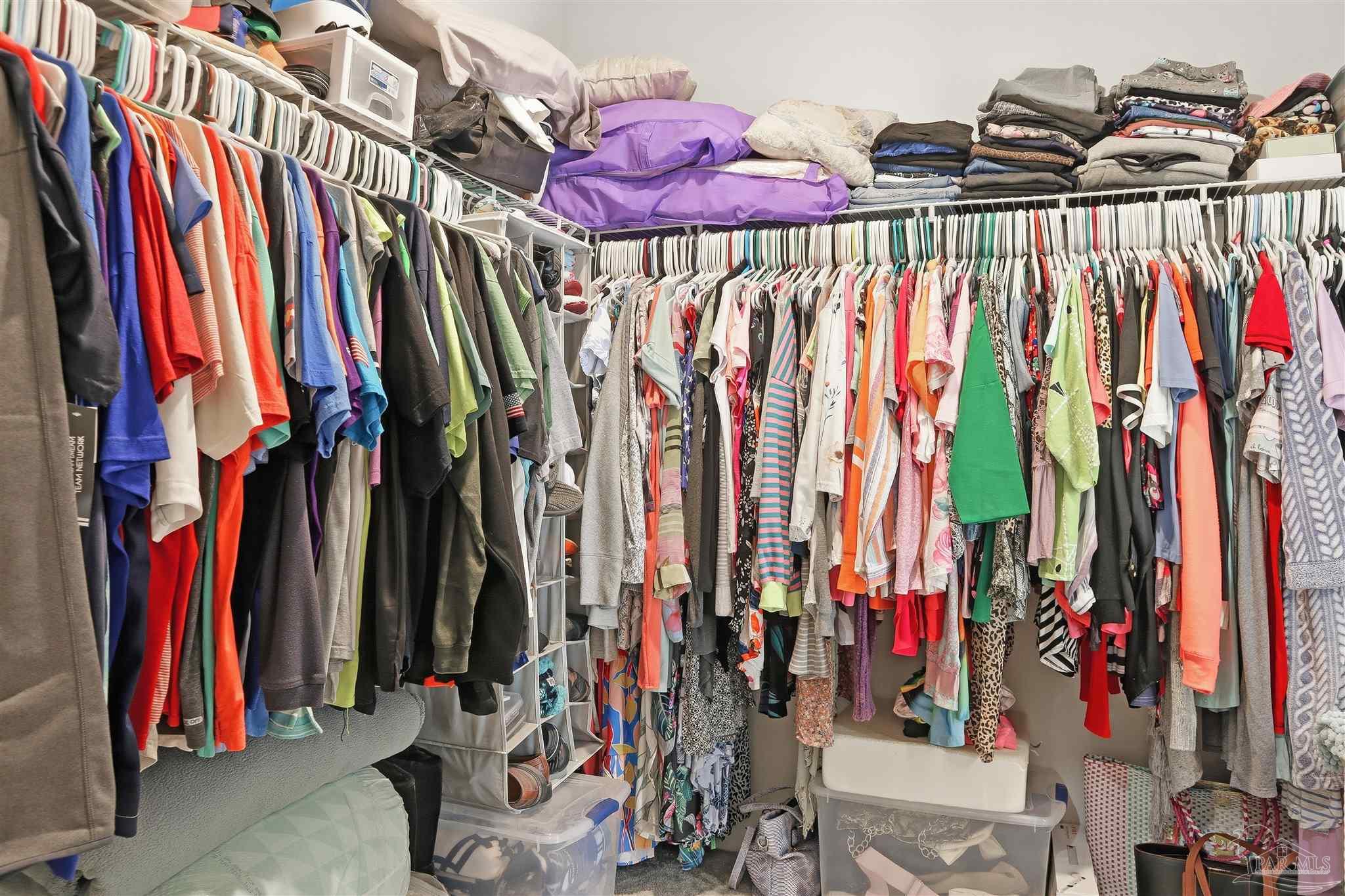 1932 Appleton Drive Cantonment, FL 32533 - Photo 48 of 57 a view of walk in closet with clothes