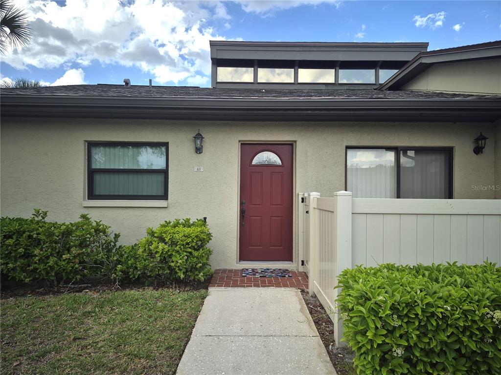 40 Dale Place Oldsmar, FL 34677 - Photo 20 of 32 a front view of a house with garden
