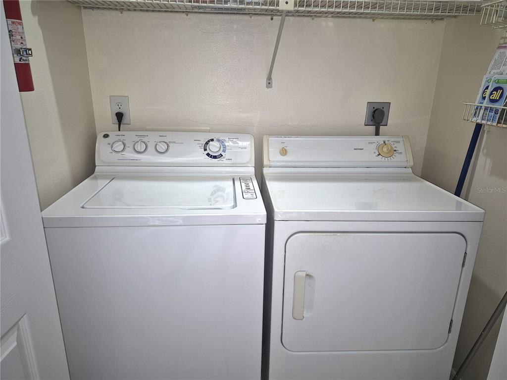 40 Dale Place Oldsmar, FL 34677 - Photo 25 of 32 a utility room with dryer and washer