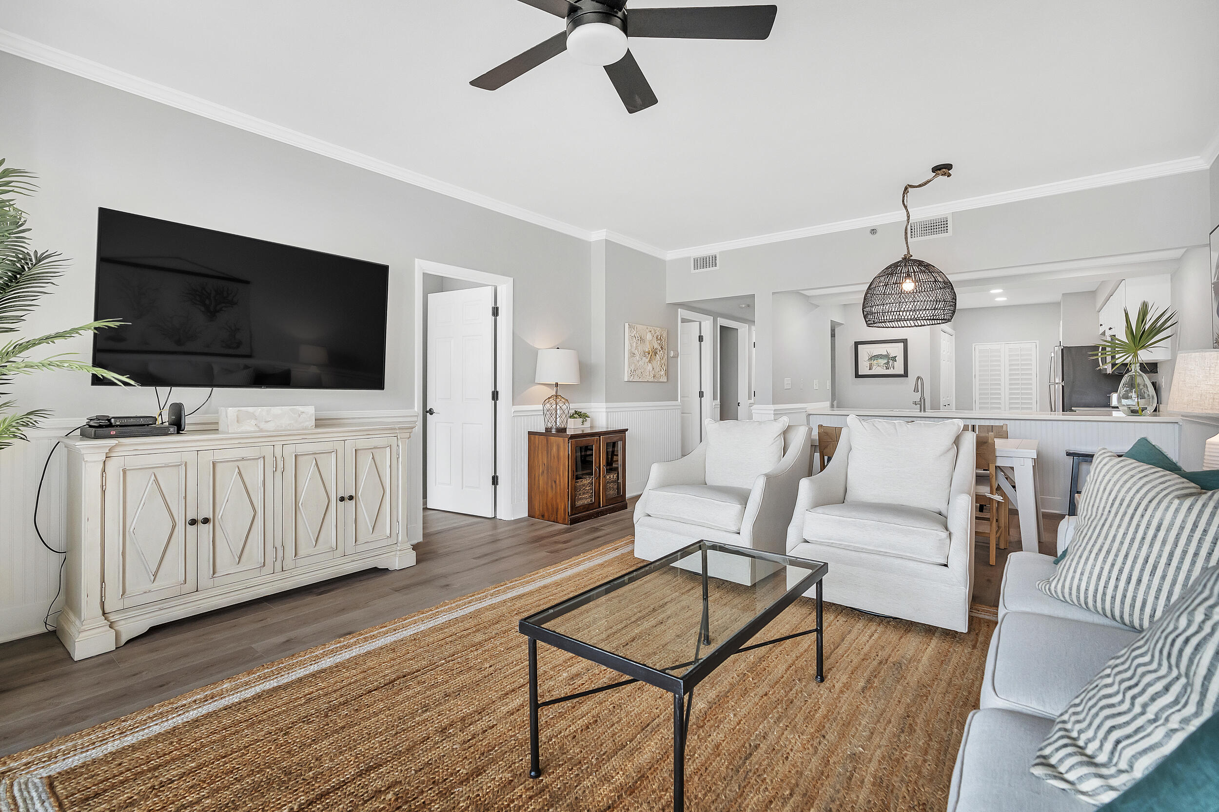 10254 East Co Highway, Unit 233 Inlet Beach, FL 32461 - Photo 14 of 46 a living room with furniture and a flat screen tv