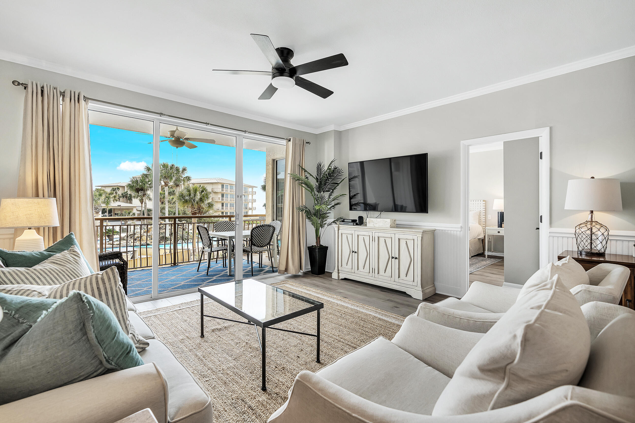 10254 East Co Highway, Unit 233 Inlet Beach, FL 32461 - Photo 15 of 46 a living room with furniture and a flat screen tv