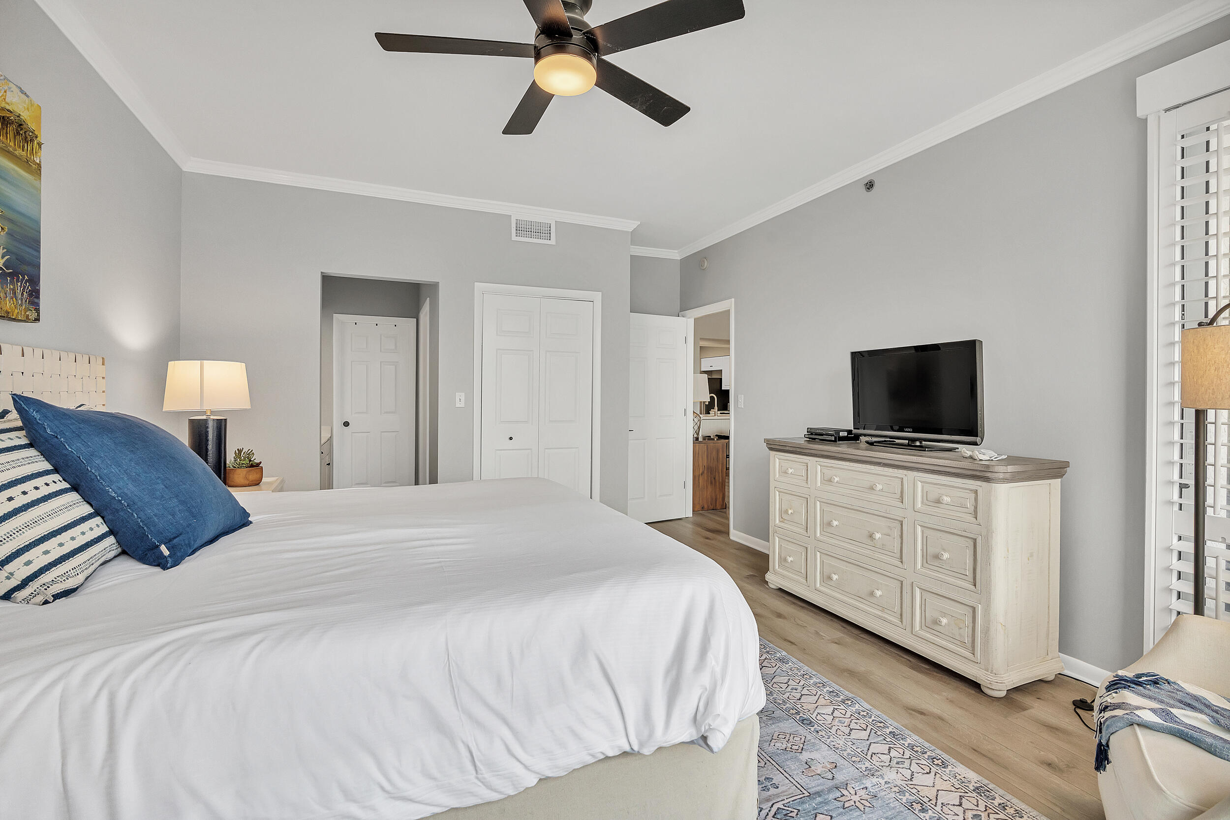 10254 East Co Highway, Unit 233 Inlet Beach, FL 32461 - Photo 22 of 46 a bedroom with a bed and a flat screen tv