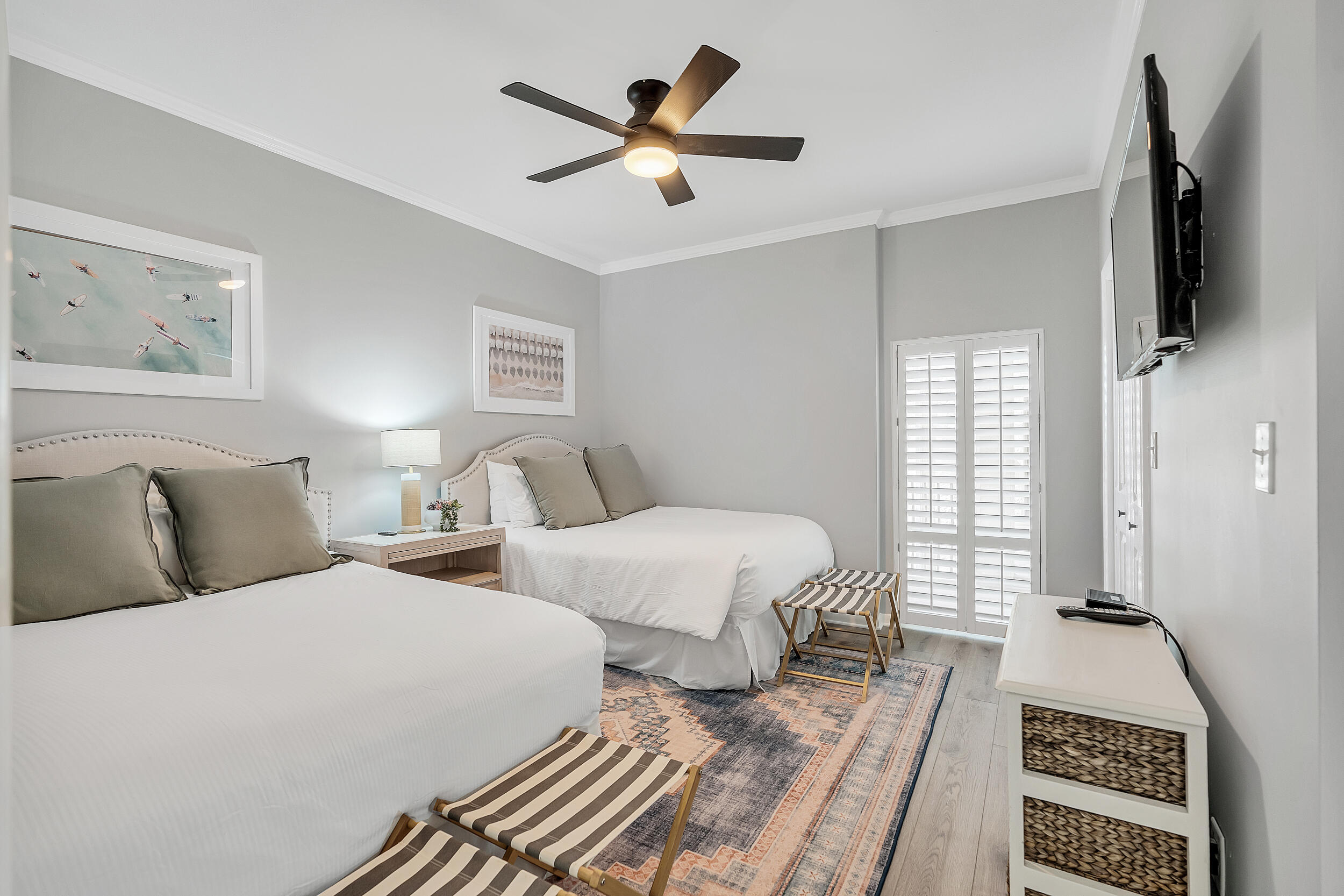 10254 East Co Highway, Unit 233 Inlet Beach, FL 32461 - Photo 25 of 46 a bedroom with two beds and a flat screen tv