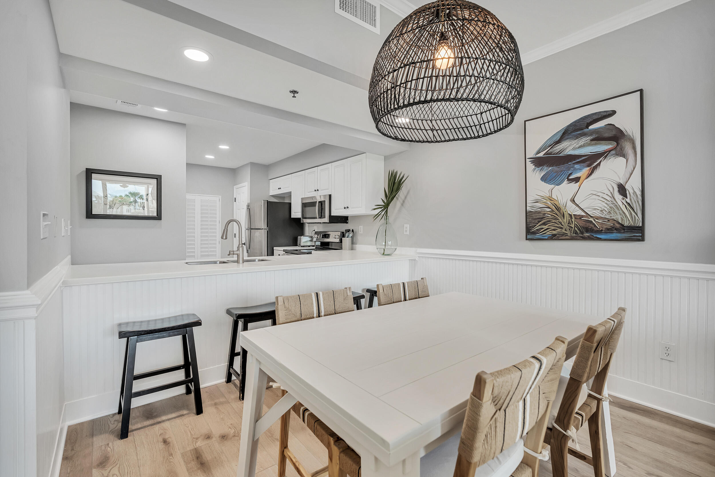 10254 East Co Highway, Unit 233 Inlet Beach, FL 32461 - Photo 10 of 46 a kitchen with furniture and a chandelier