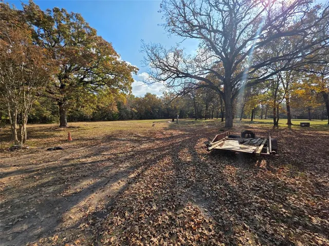 a house with trees in front of it
