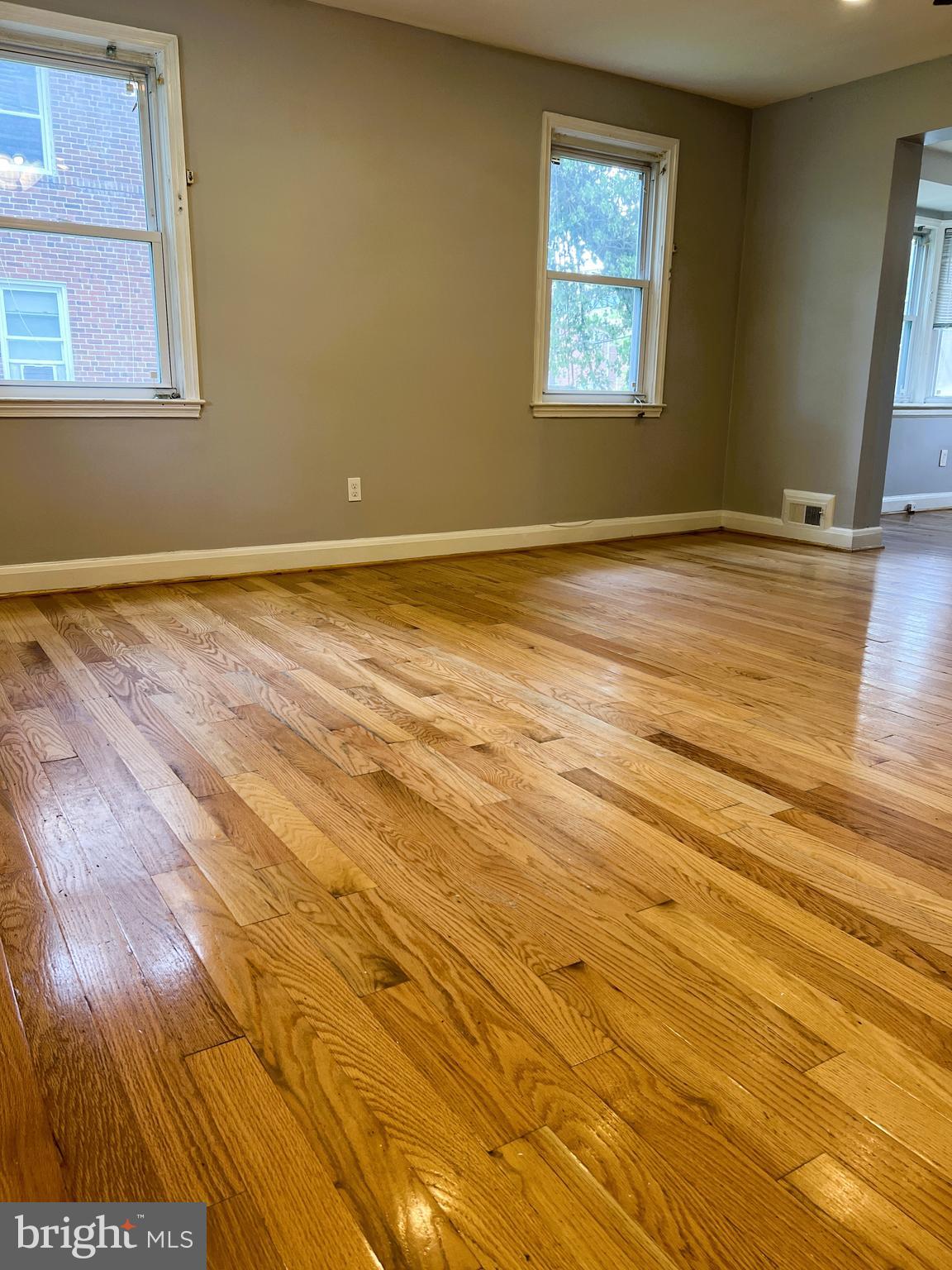 3705 Bancroft Road Baltimore, MD 21215 - Photo 20 of 50 a view of a room with wooden floor and window