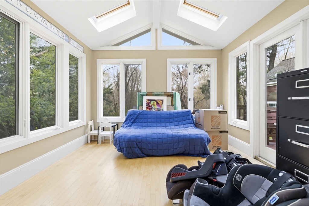 17 Wellesley Street Weston, MA 02493 - Photo 12 of 30 a bedroom with furniture and large windows