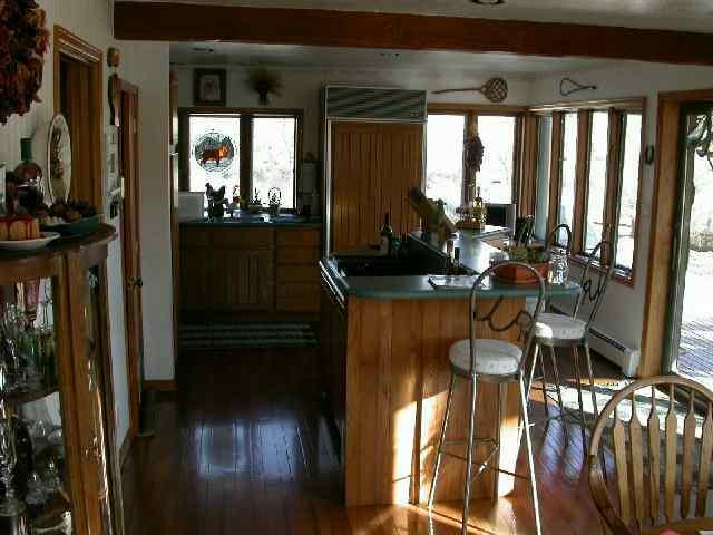 1980 Highway 325 Rifle, CO 81650 - Photo 4 of 9 a living room with furniture and a floor to ceiling window
