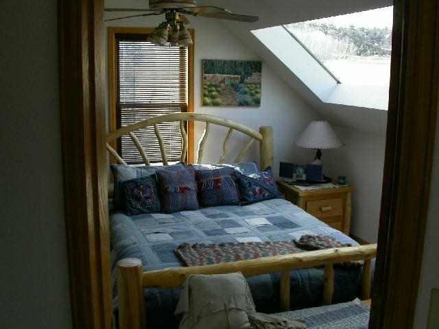 1980 Highway 325 Rifle, CO 81650 - Photo 7 of 9 a living room with a bed furniture and a window