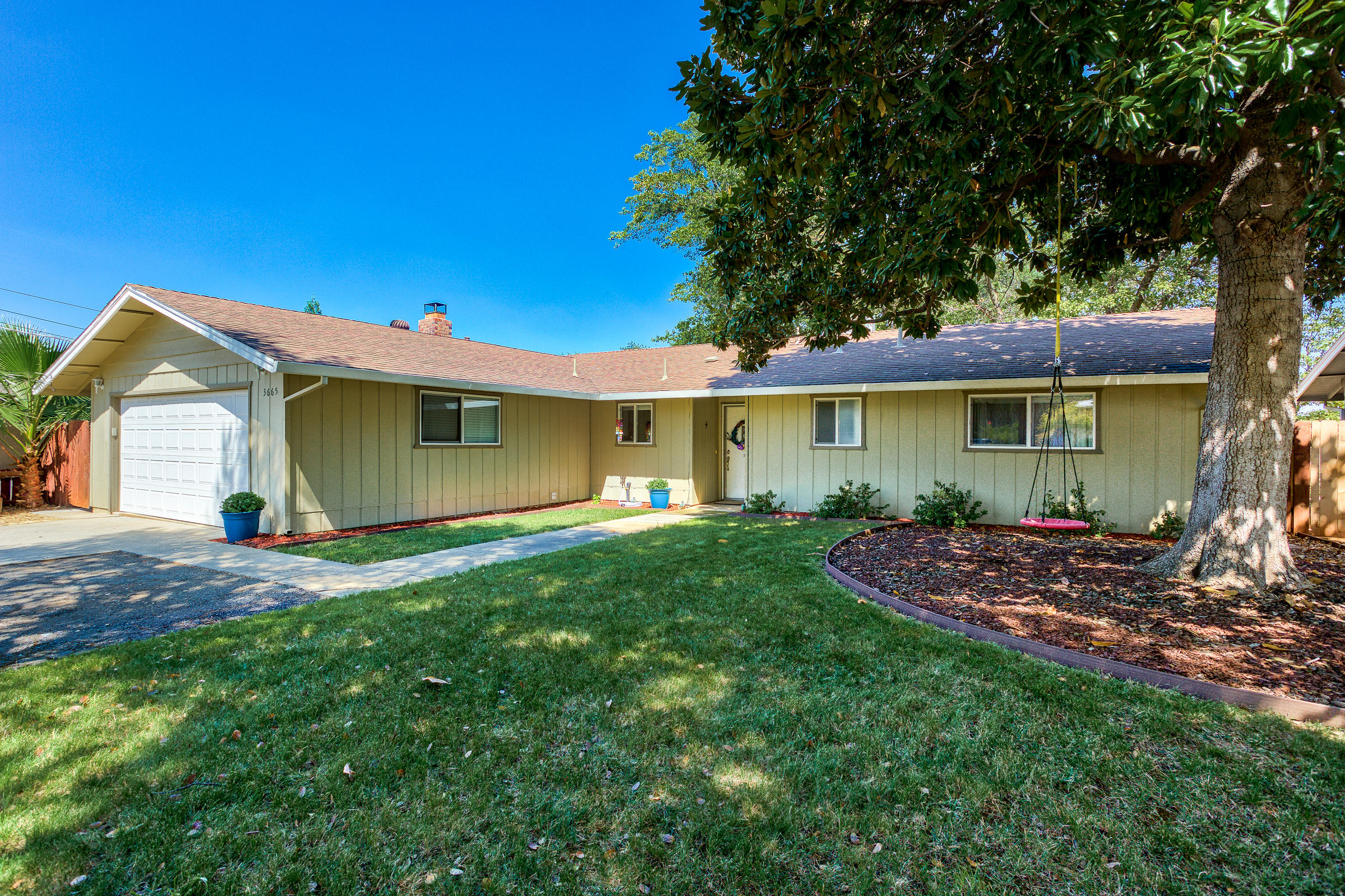 3665 Echo Road Redding, CA 96002 - Photo 1 of 33 a view of a house with a yard