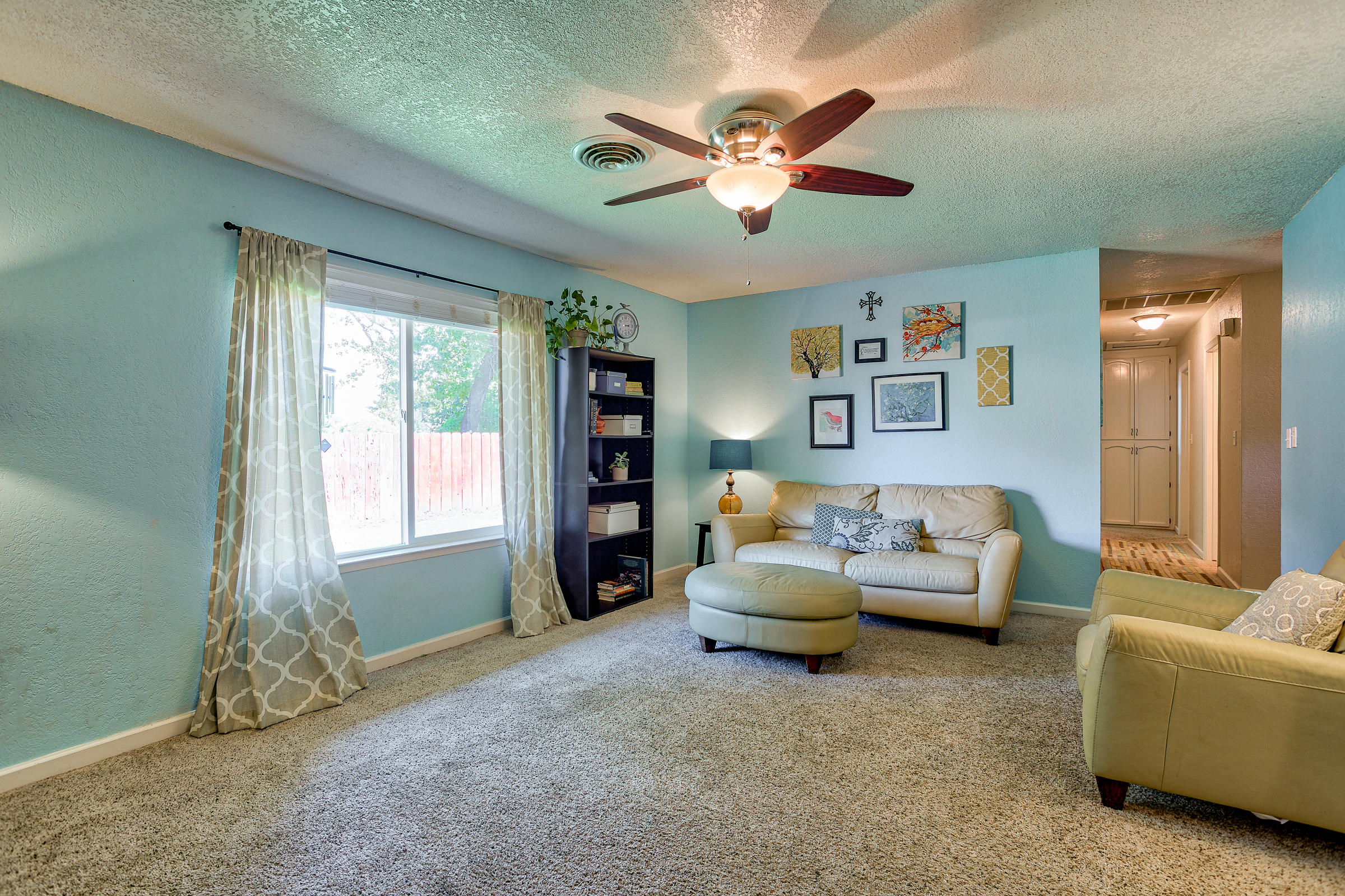 3665 Echo Road Redding, CA 96002 - Photo 14 of 33 a living room with furniture and a window
