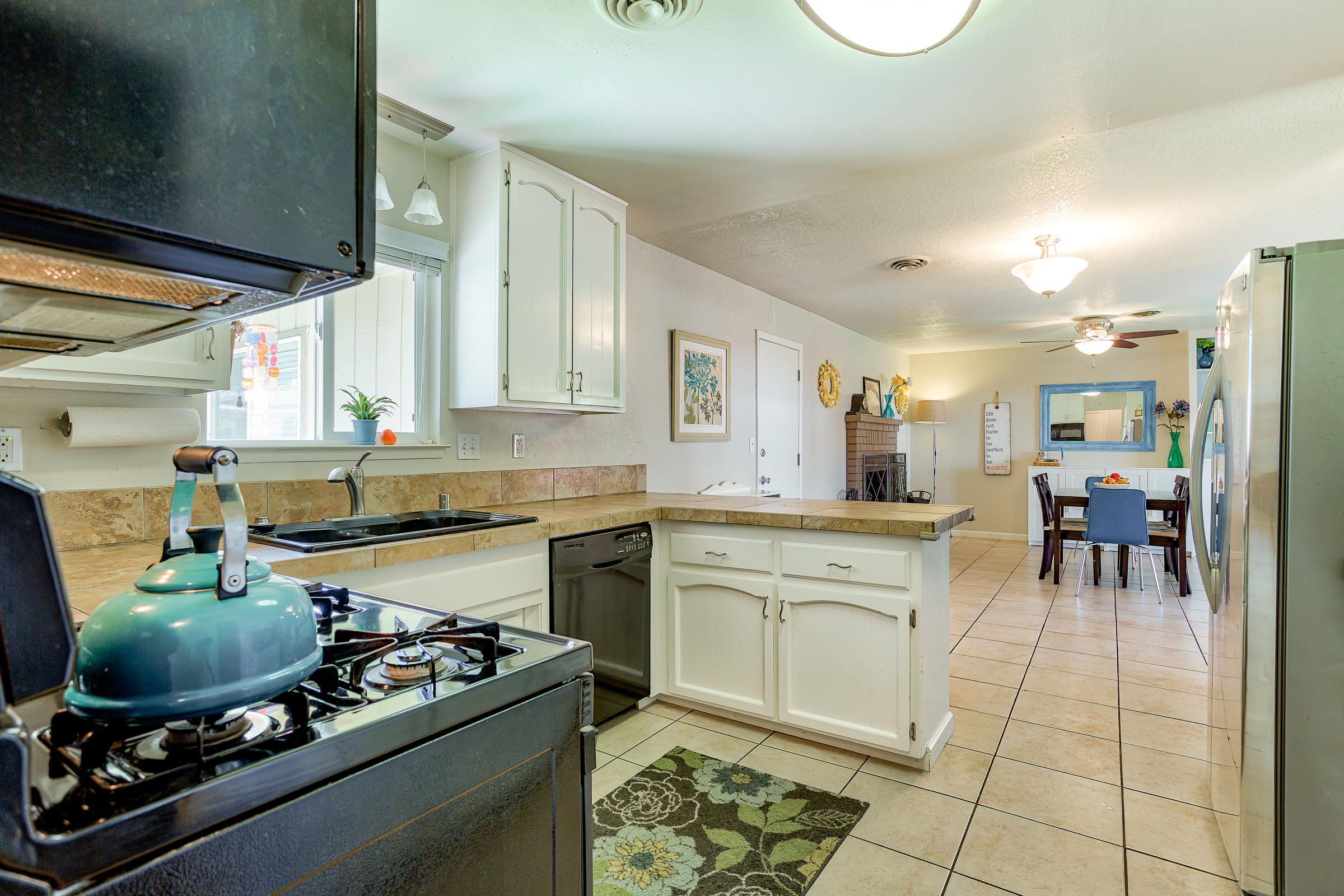 3665 Echo Road Redding, CA 96002 - Photo 3 of 33 a kitchen with a stove and a sink