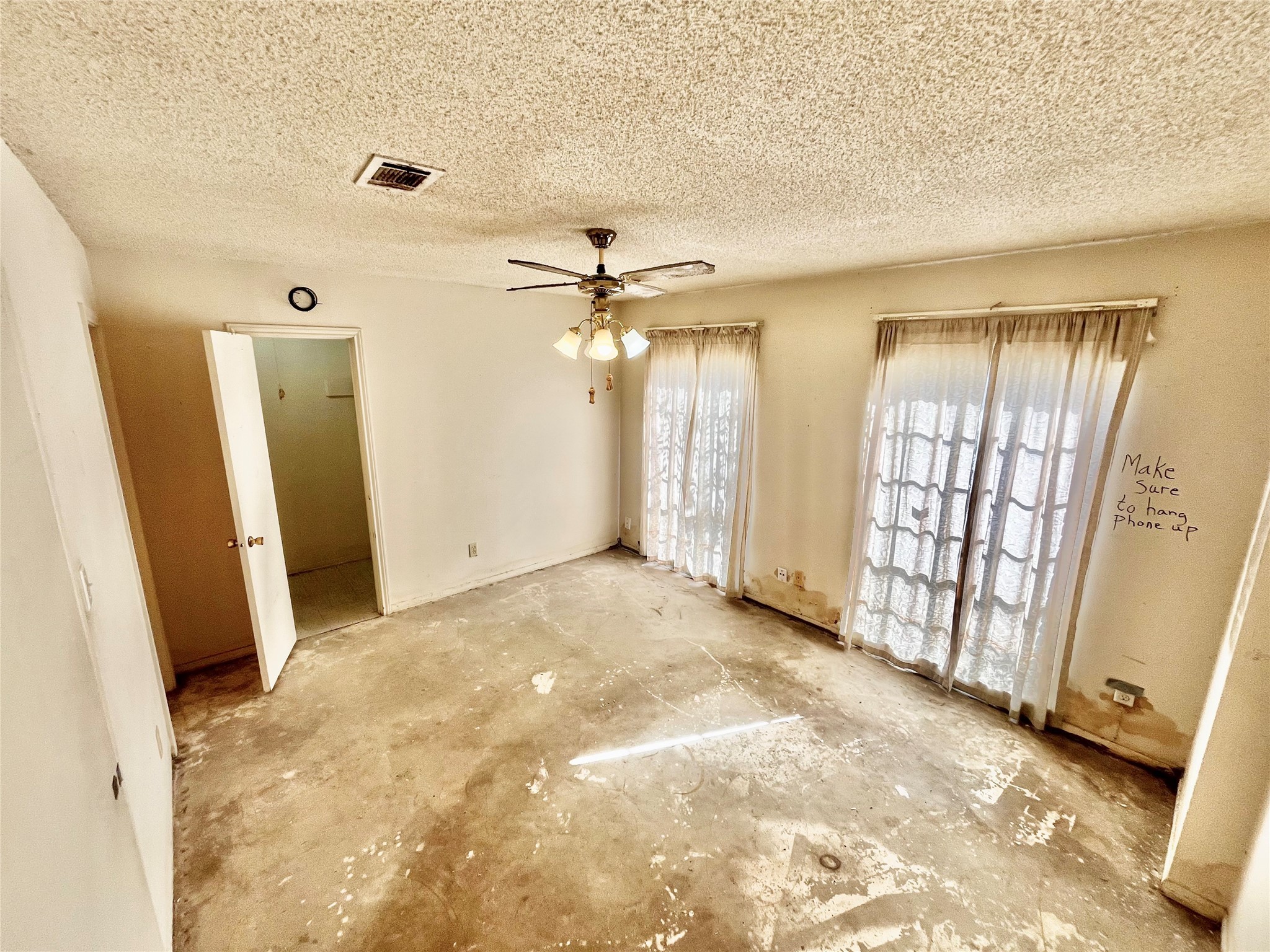 9442 Neuens Road, Unit 9442 Houston, TX 77080 - Photo 13 of 24 an empty room with windows and entrance