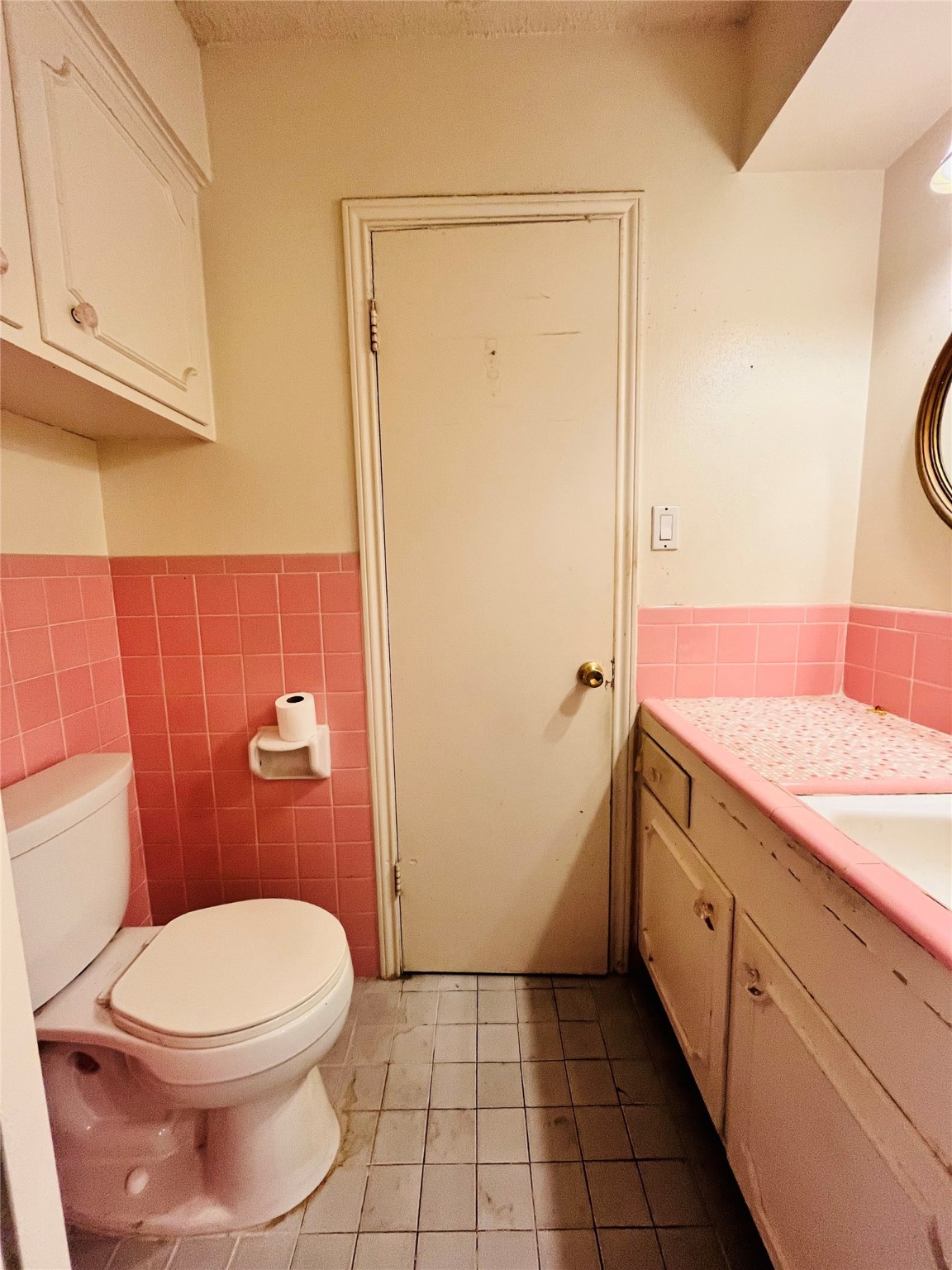 9442 Neuens Road, Unit 9442 Houston, TX 77080 - Photo 15 of 24 a bathroom with a granite countertop toilet and a sink