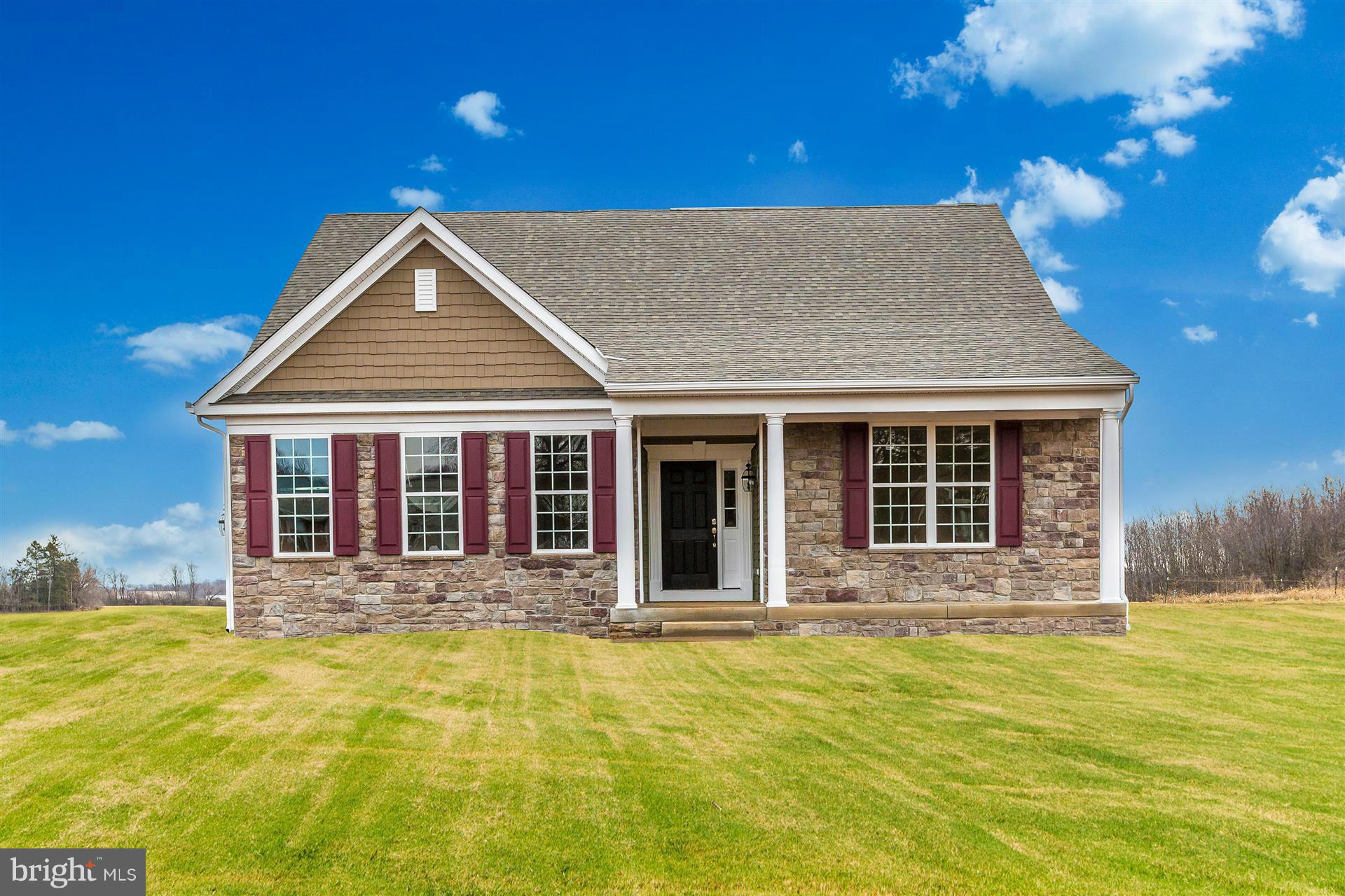 front view of a house with a swimming pool