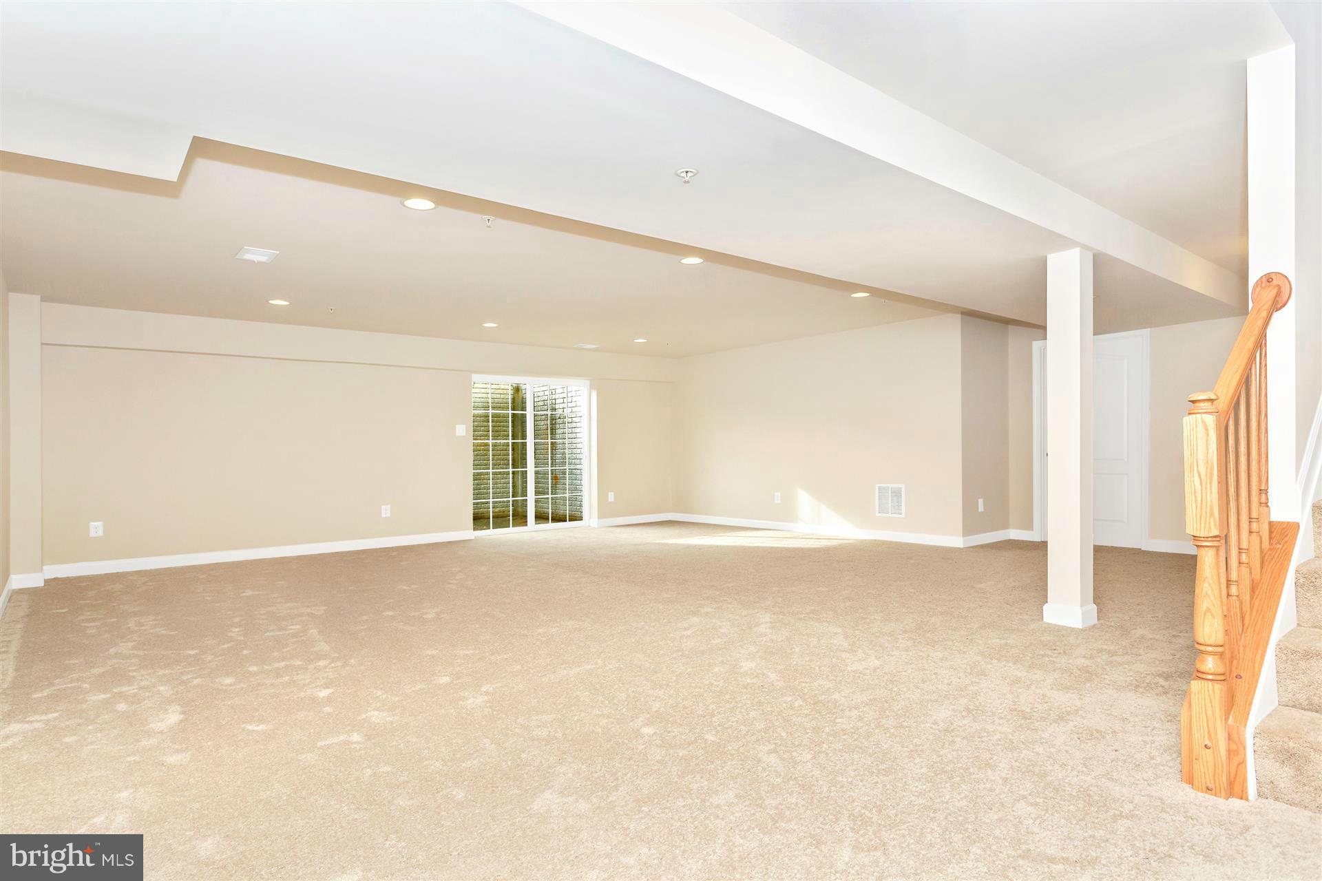 5305 Renn Road Frederick, MD 21703 - Photo 7 of 13 a view of an empty room with a window