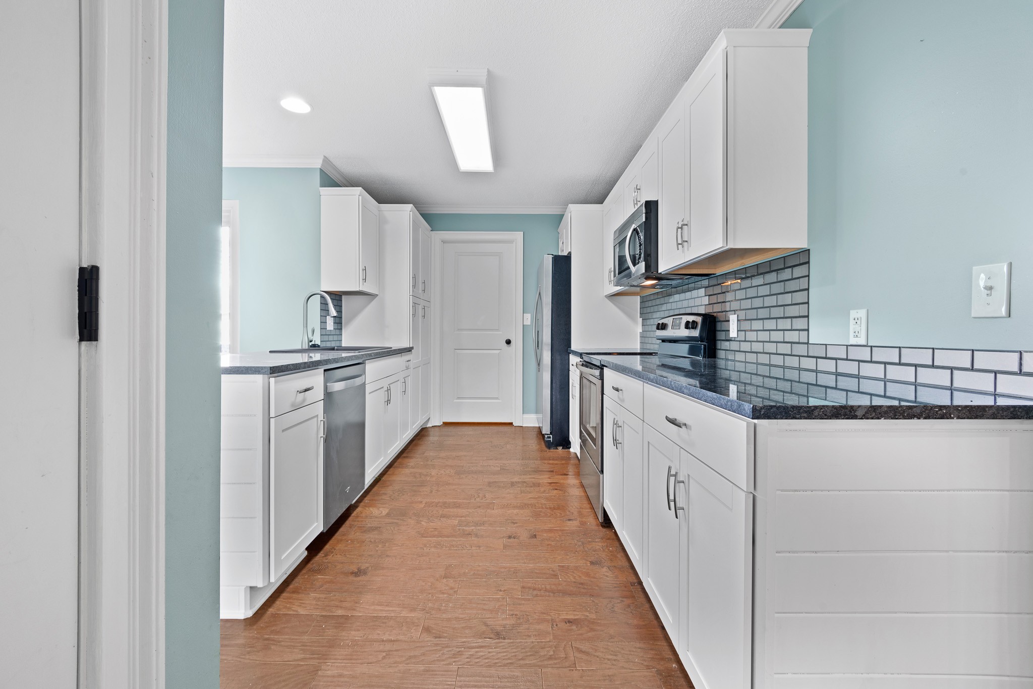 60 Sharp Circle Winchester, TN 37398 - Photo 19 of 51 a kitchen with stainless steel appliances a sink and cabinets