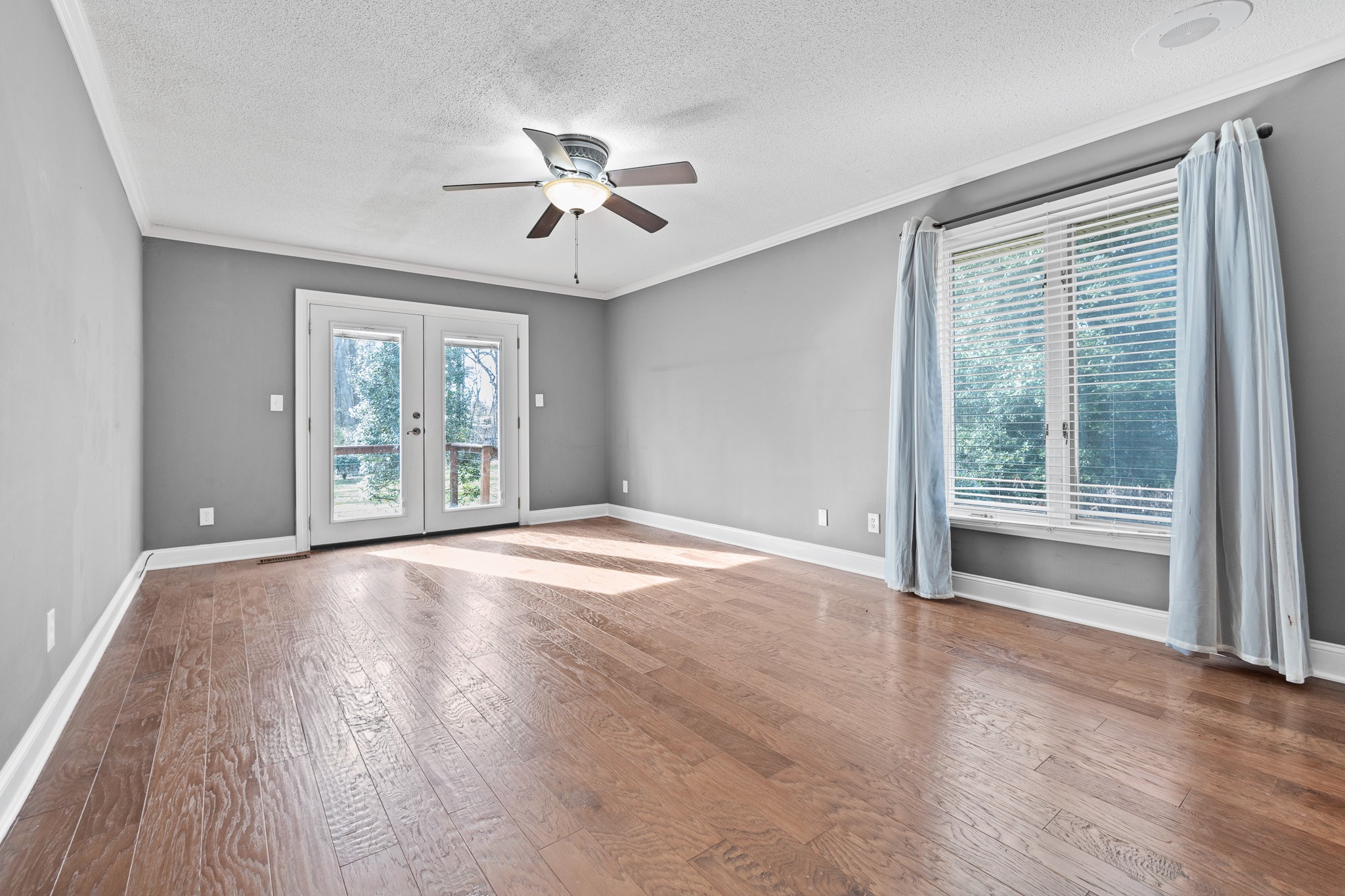 60 Sharp Circle Winchester, TN 37398 - Photo 7 of 51 a view of an empty room with wooden floor and a window