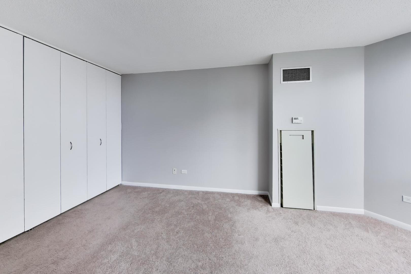 111 West Maple Street, Unit 1503 Chicago, IL 60610 - Photo 20 of 39 a view of an empty room