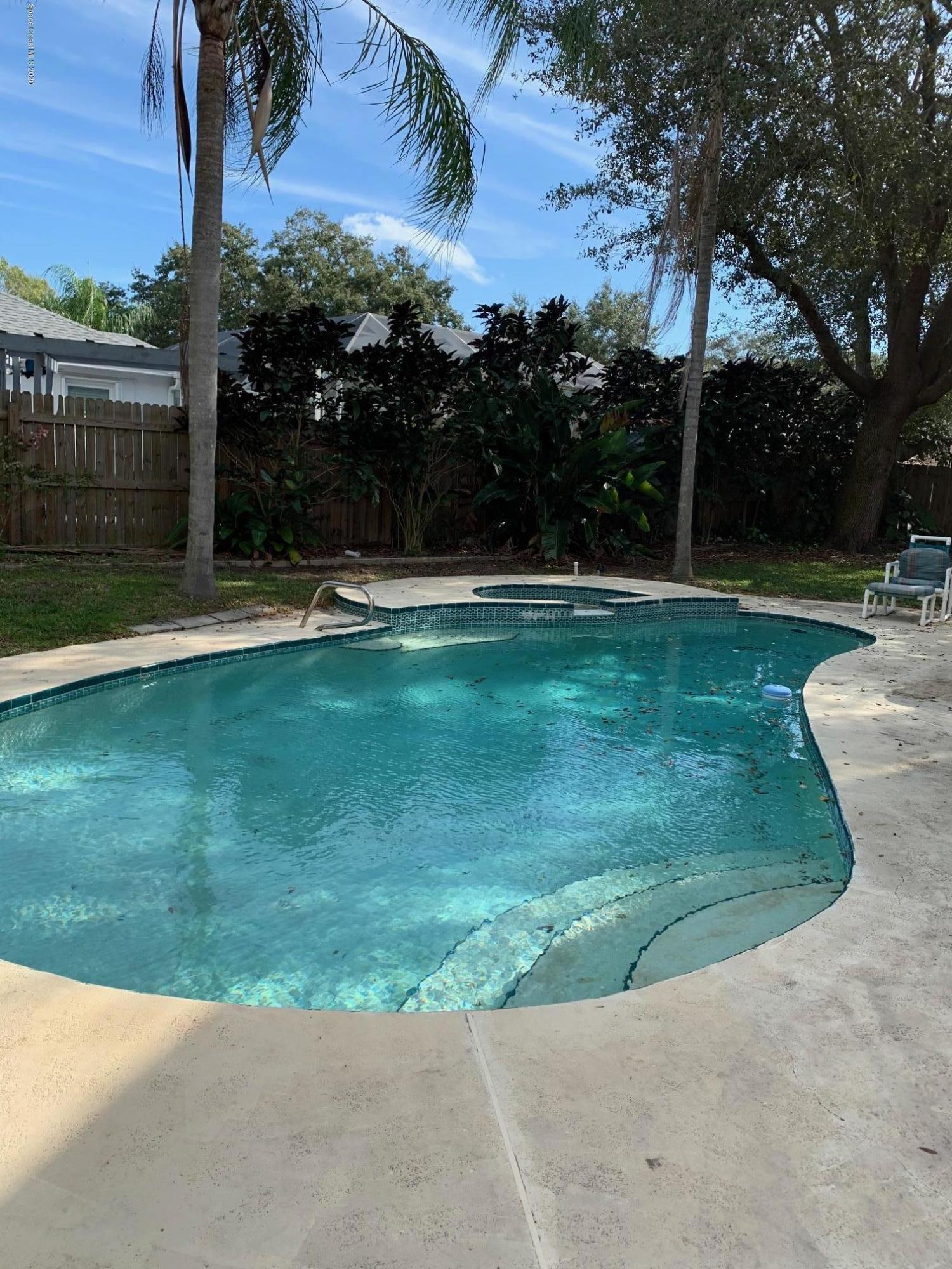 3358 Lakeview Circle Melbourne, FL 32934 - Photo 12 of 14 a view of a garden with a slide