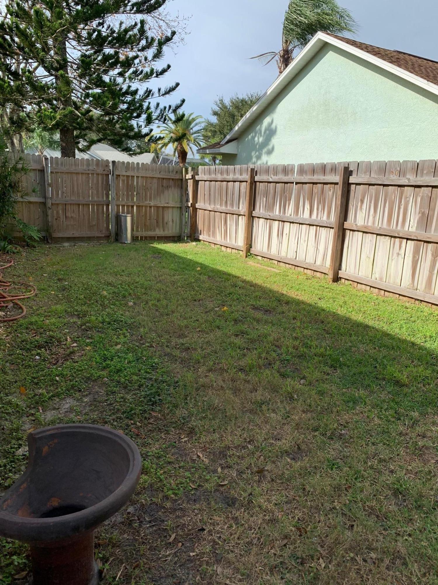 3358 Lakeview Circle Melbourne, FL 32934 - Photo 13 of 14 a view of outdoor space and yard