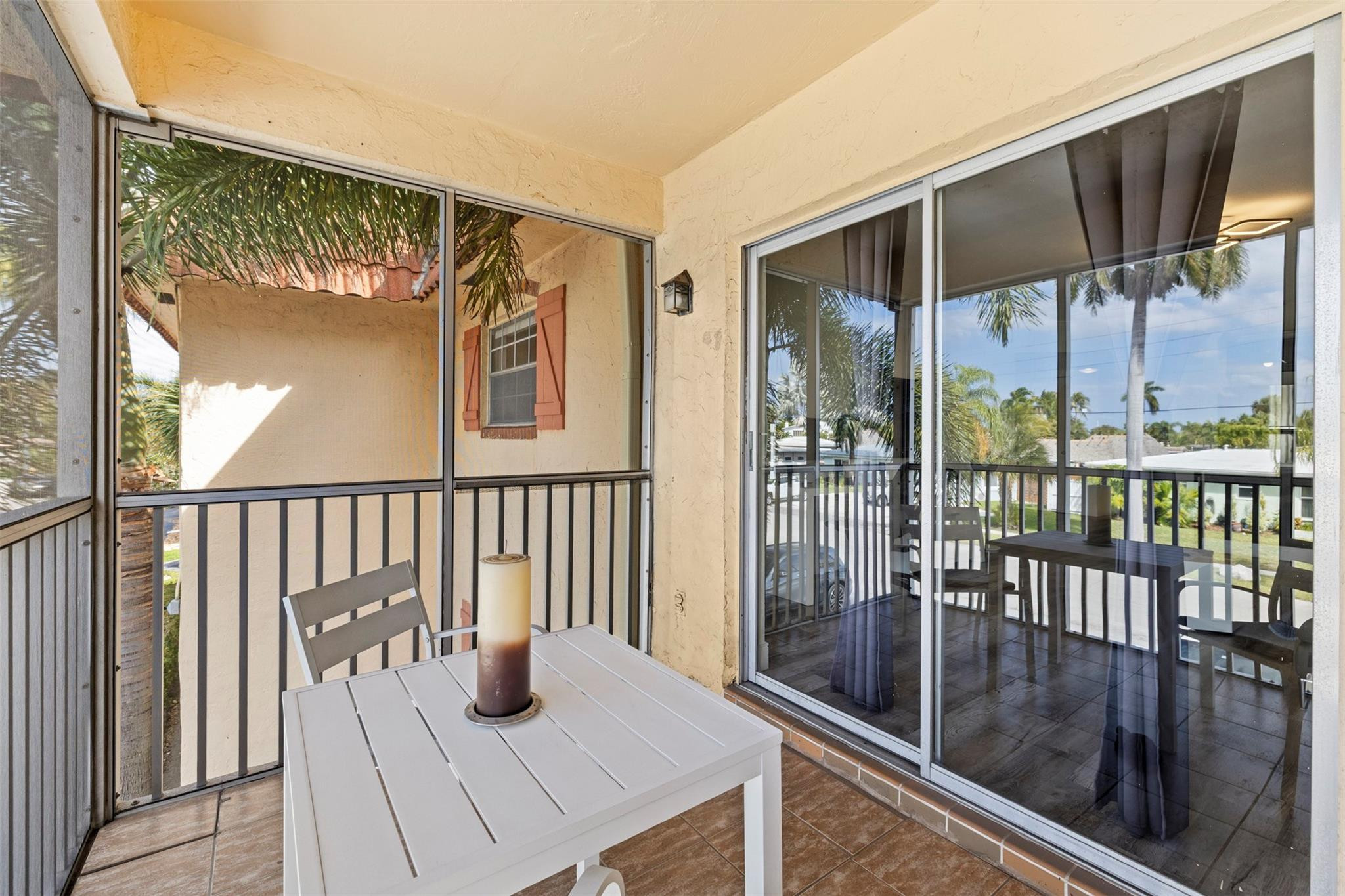 101 East McNab Road, Unit 219 Pompano Beach, FL 33060 - Photo 14 of 26 a view of a balcony dining area