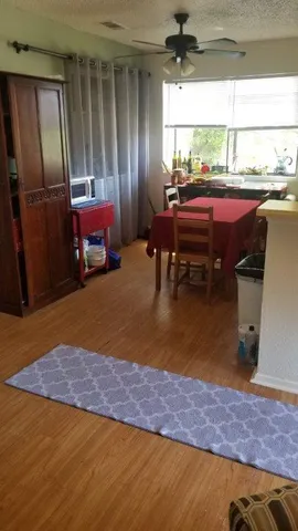 a bedroom with furniture and window