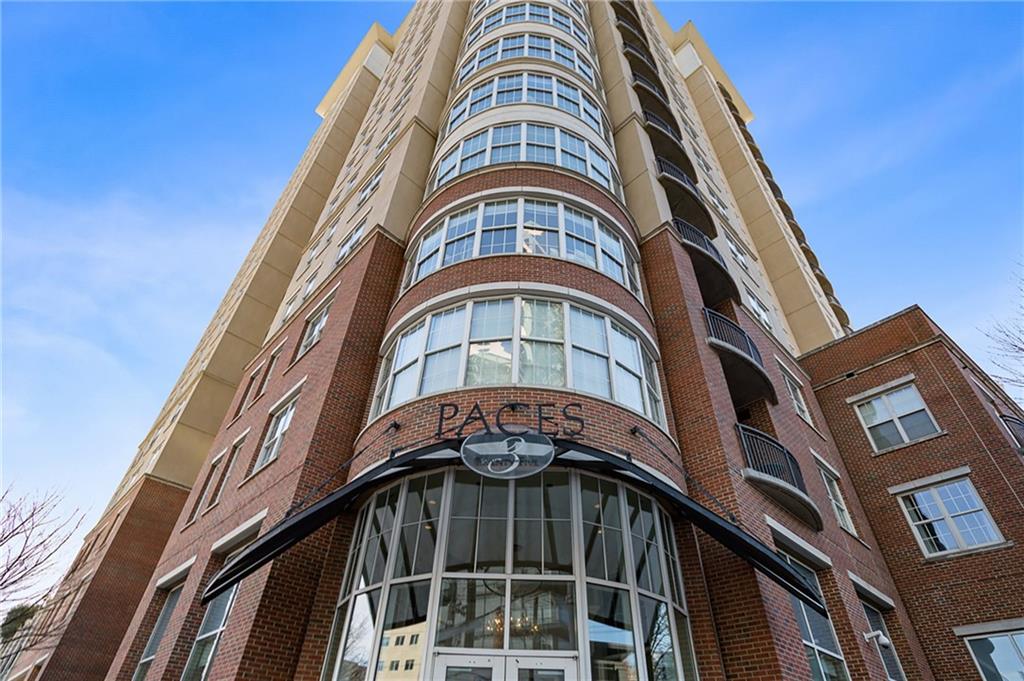 325 East Paces Ferry Road Northeast, Unit 1711 Atlanta, GA 30305 - Photo 19 of 29 a front view of a multi story building