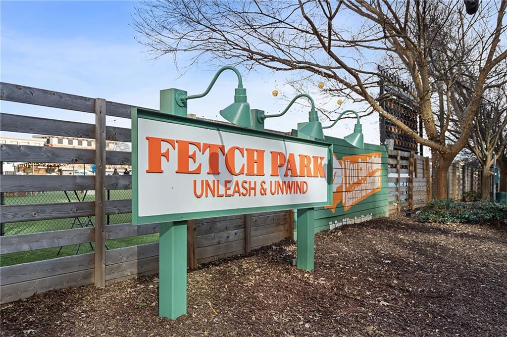 325 East Paces Ferry Road Northeast, Unit 1711 Atlanta, GA 30305 - Photo 24 of 29 a sign that is on the side of the road